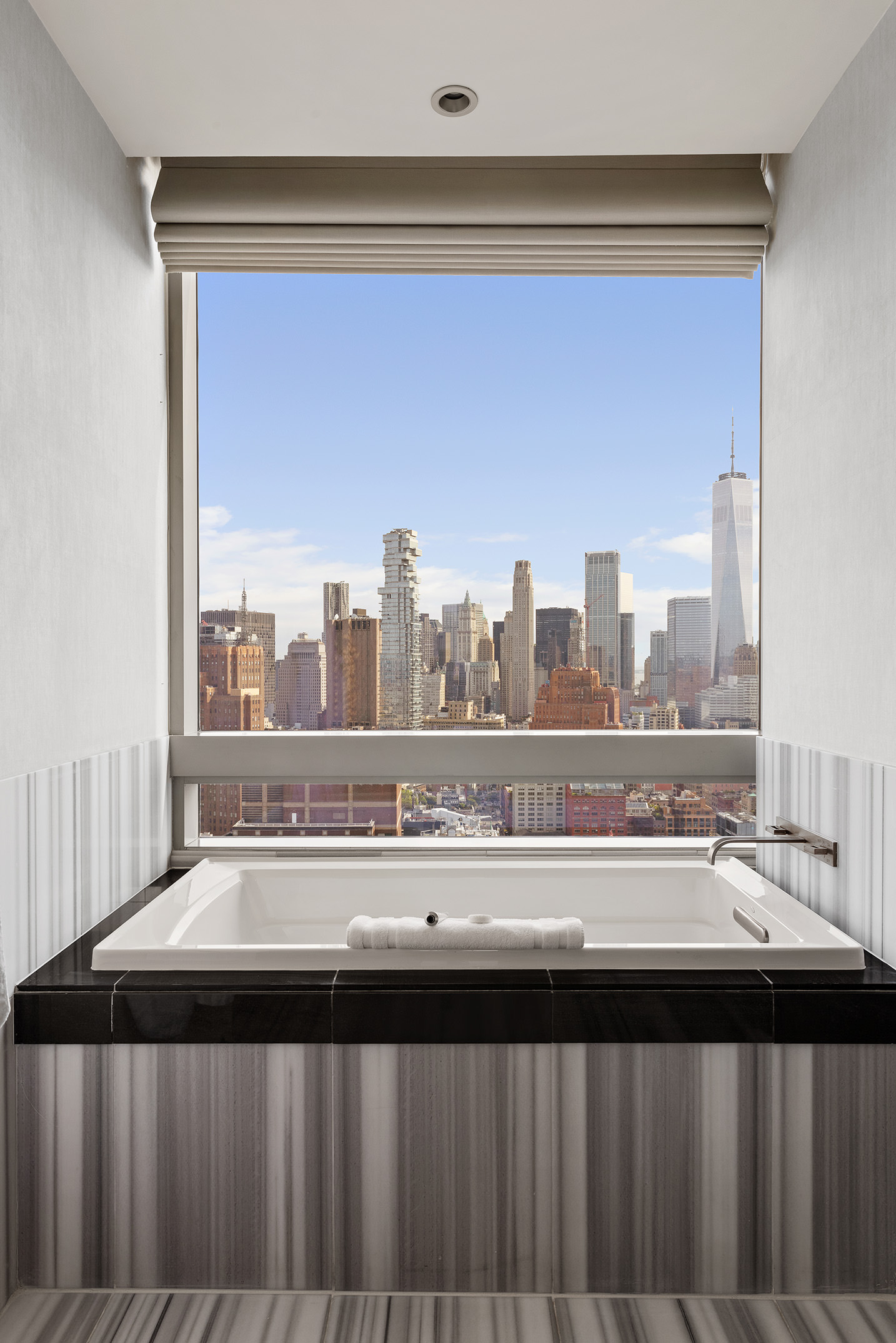 246 Spring Street, Unit 4104 Manhattan, NY 10013 - Photo 5 of 8 a view of a city from a balcony