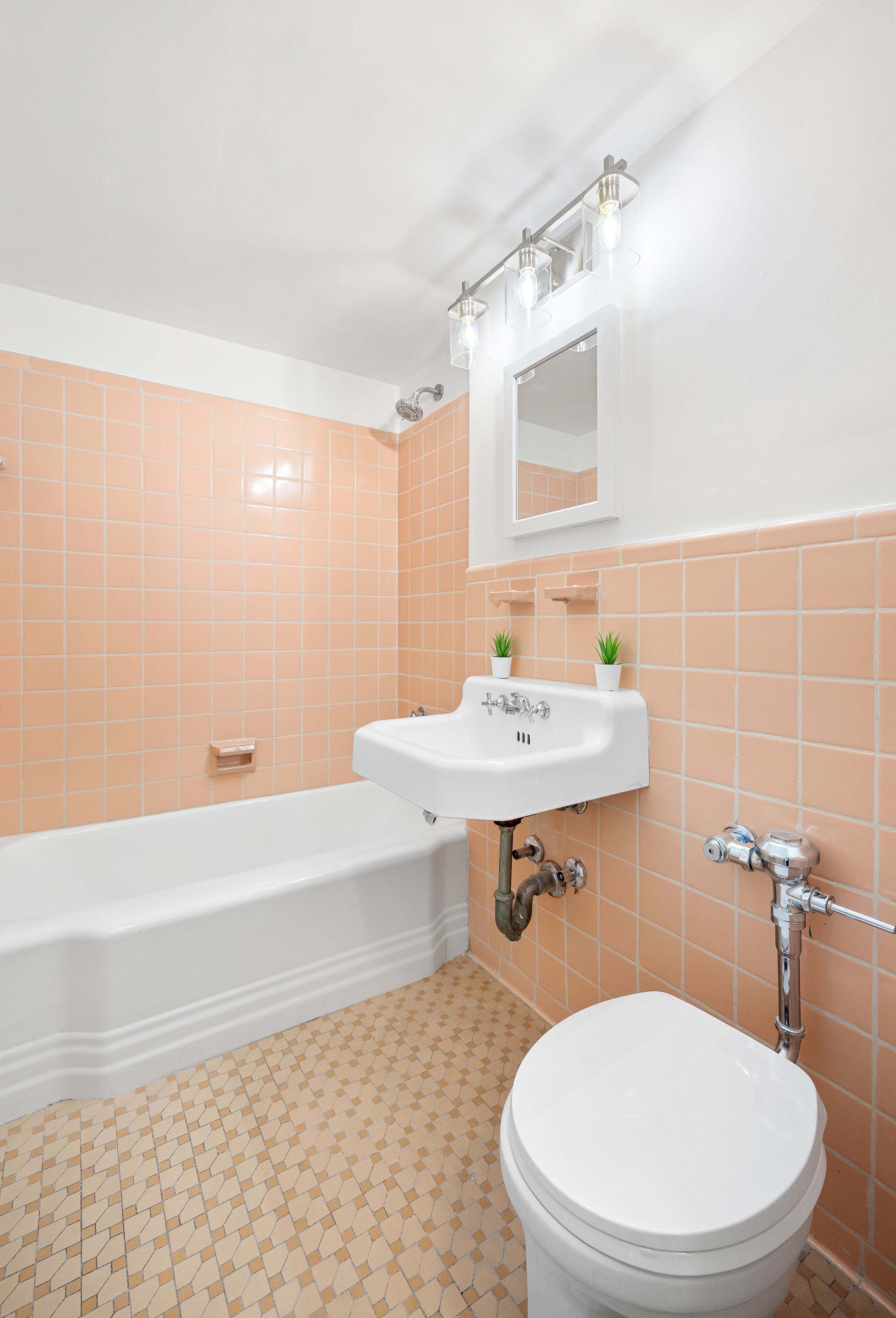35-51 85th Street, Unit 4M Queens, NY 11372 - Photo 9 of 10 a bathroom with a sink a toilet and bathtub
