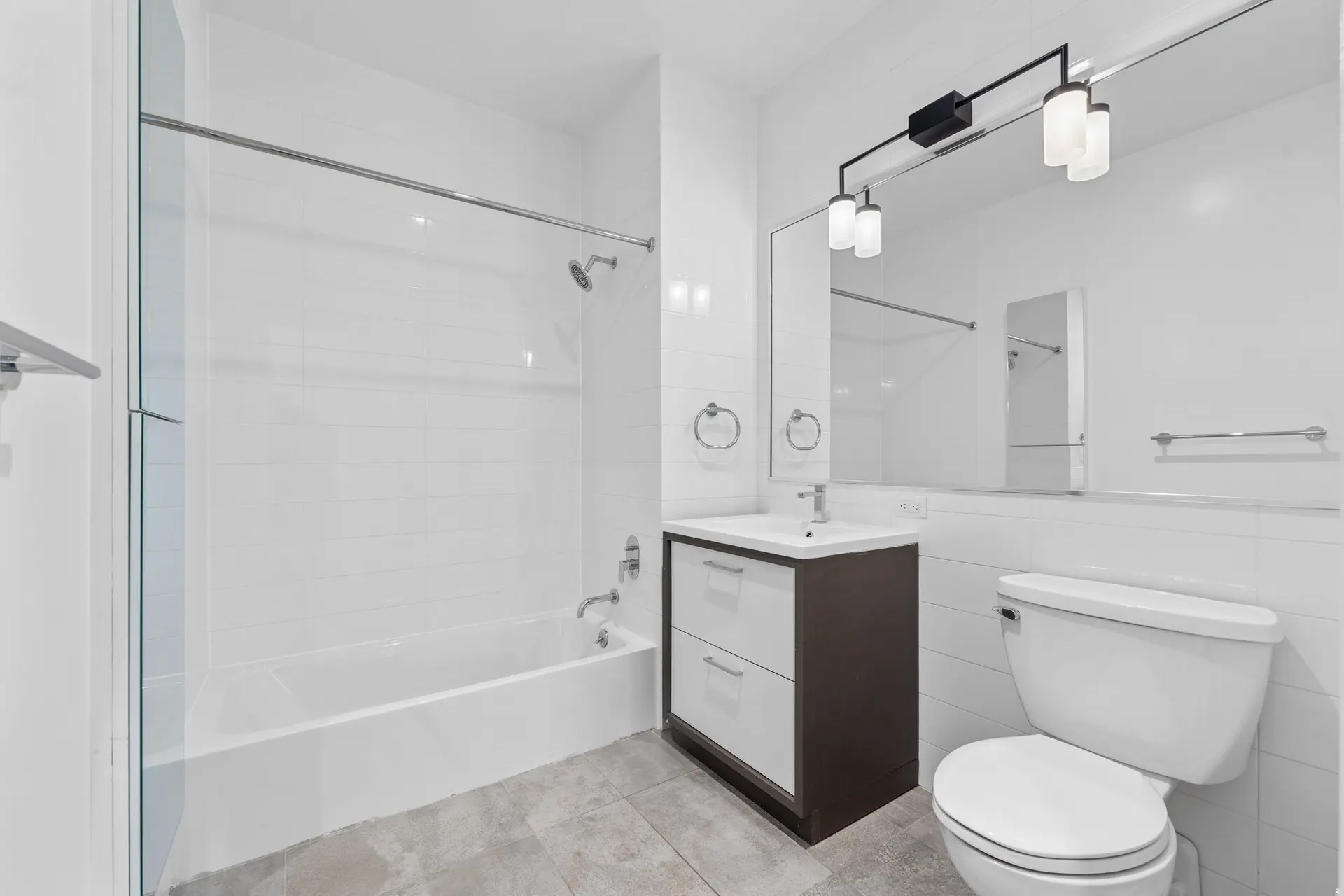 350 Clarkson Avenue, Unit 103 Brooklyn, NY 11226 - Photo 11 of 42 a bathroom with a sink a toilet and shower