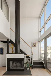 a view of an entryway with wooden floor