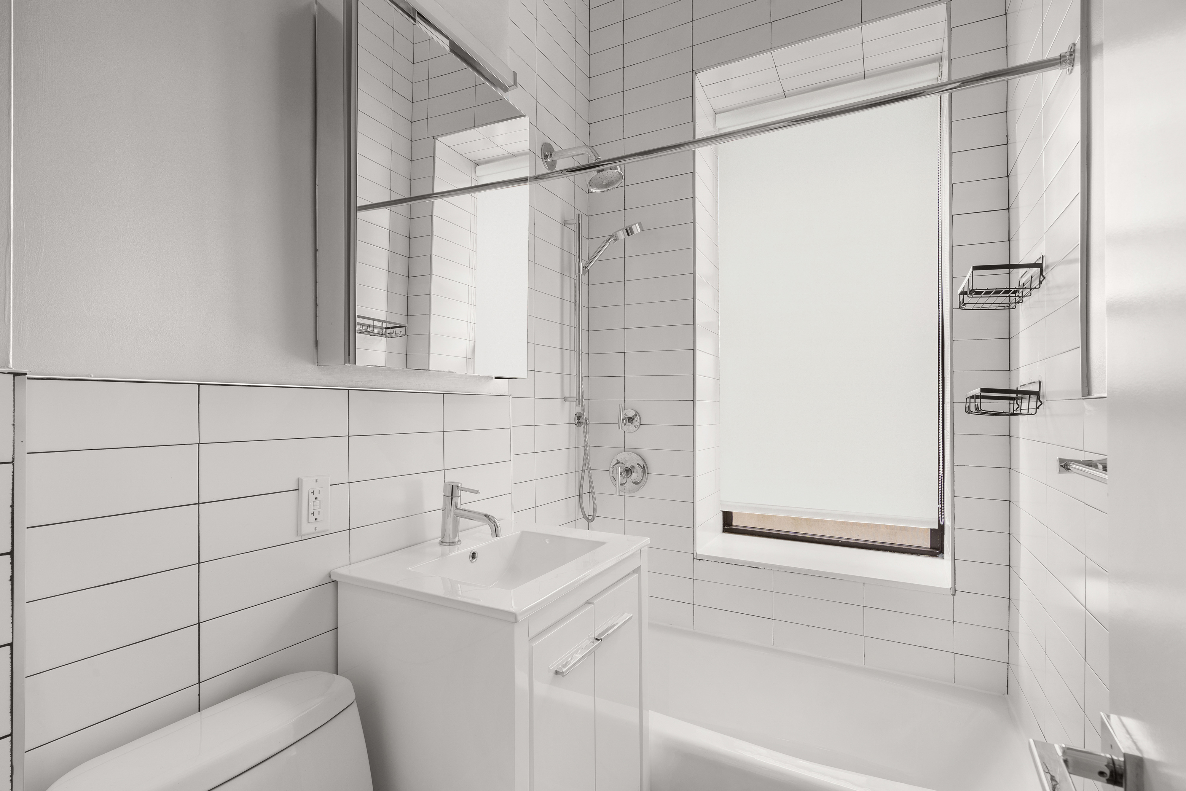 265 Riverside Drive, Unit 1C Manhattan, NY 10025 - Photo 8 of 10 a bathroom with a sink a toilet and shower