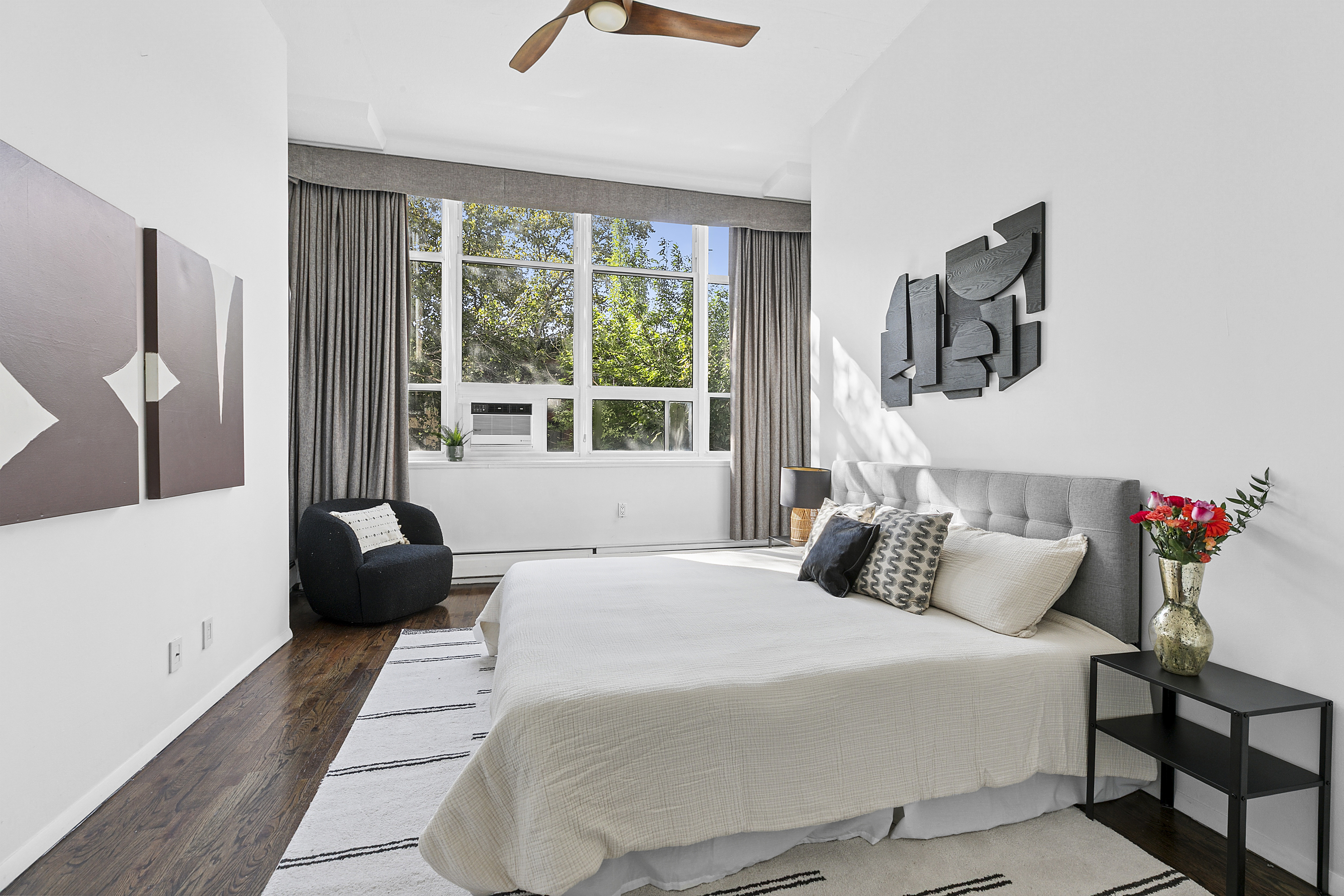 505 Court Street, Unit 3D Brooklyn, NY 11231 - Photo 4 of 14 a bedroom with a bed and wooden floor