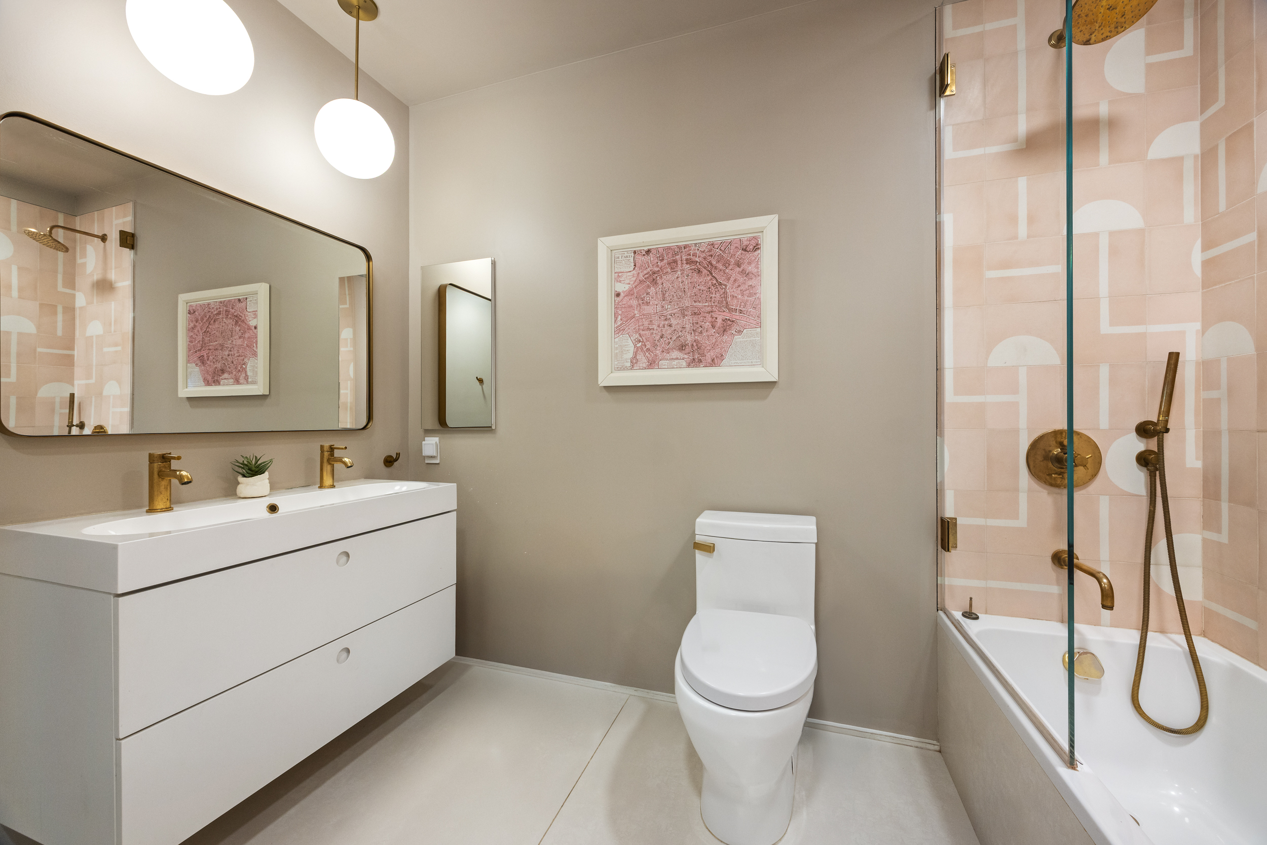 622 Greenwich Street, Unit 4B Manhattan, NY 10014 - Photo 23 of 27 a bathroom with a toilet sink and mirror