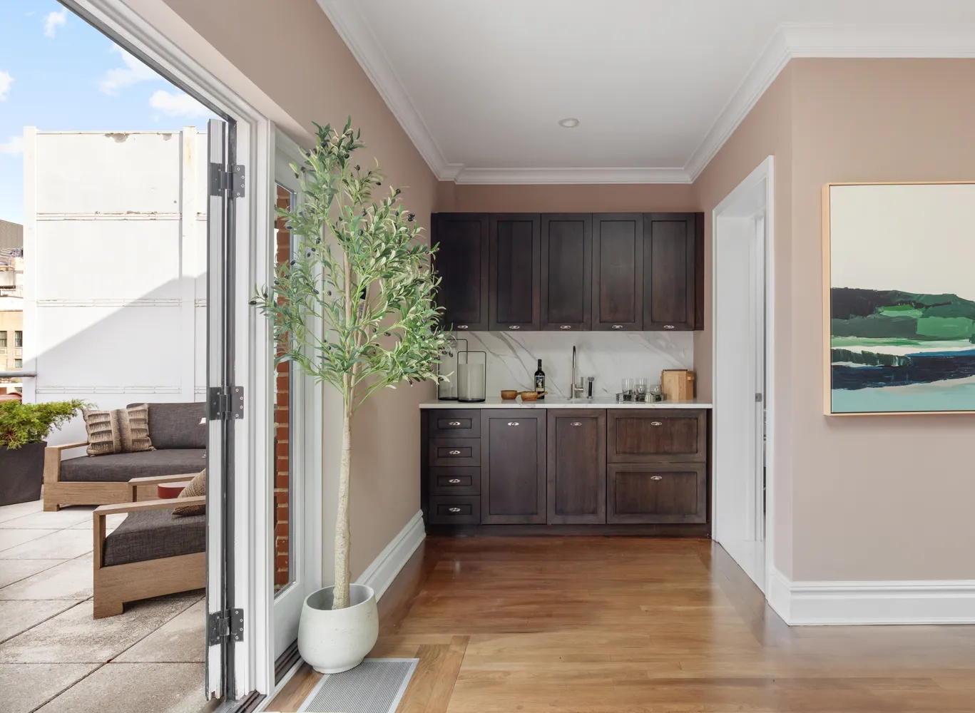 a bathroom with a sink a toilet and mirror