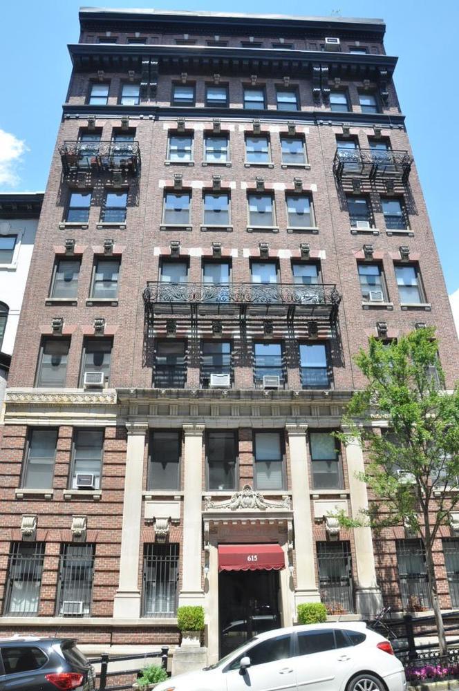 615 West 113th Street, Unit 3132 Manhattan, NY 10025 - Photo 10 of 13 a tall building sitting in front of a building