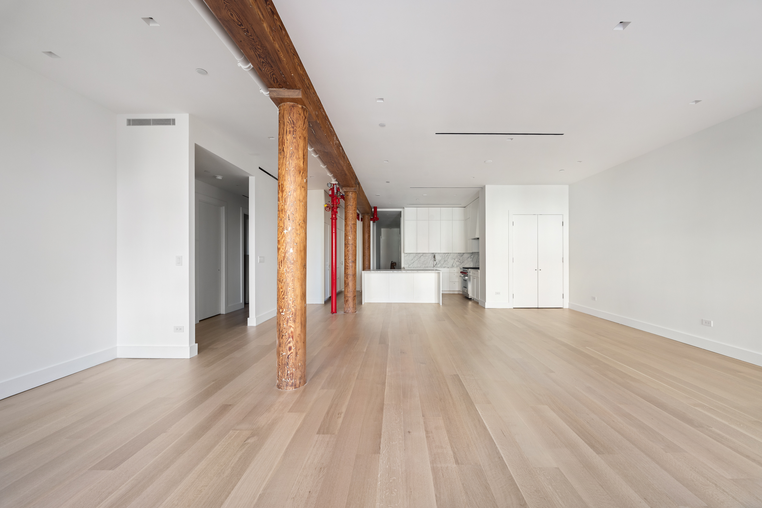 243 West Broadway, Unit 3 Manhattan, NY 10013 - Photo 7 of 25 a view of a hallway with wooden floor