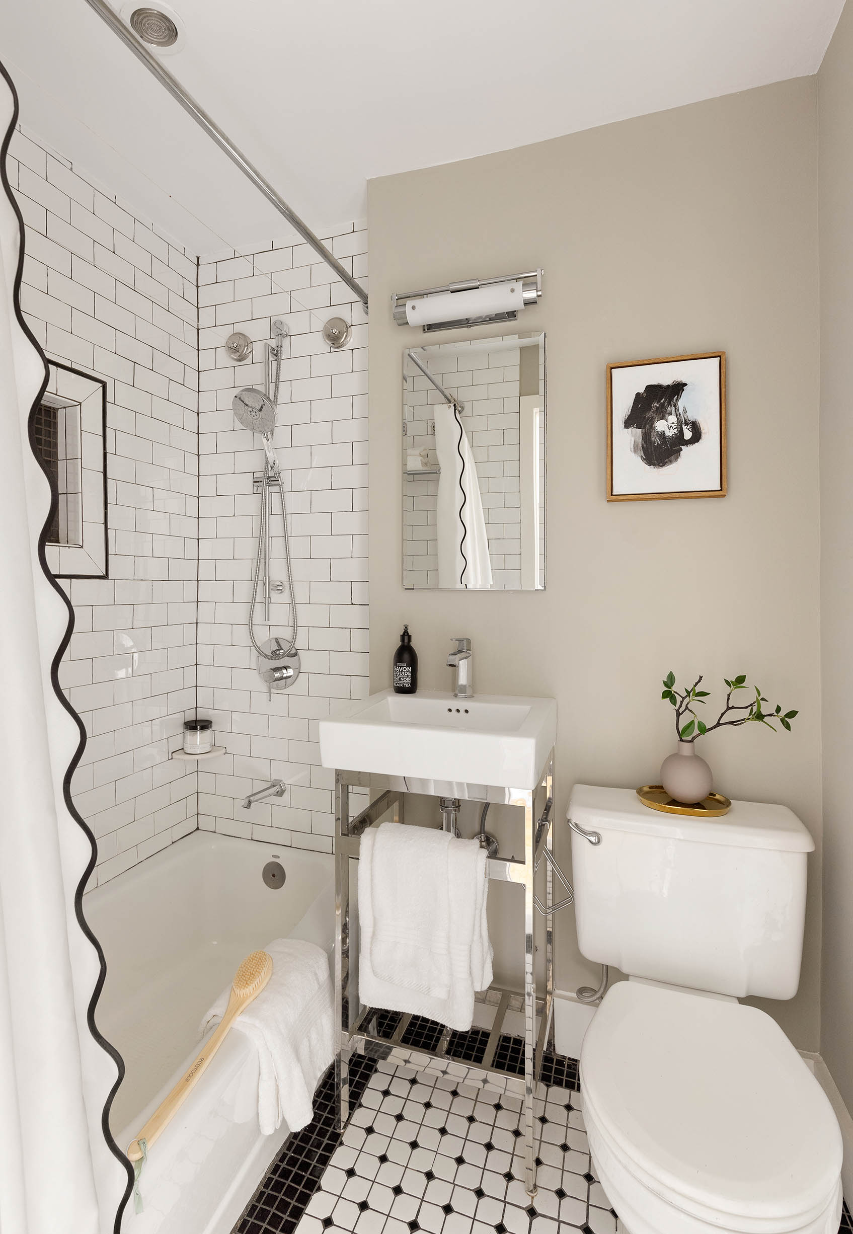 166 West 76th Street, Unit 5DE Manhattan, NY 10023 - Photo 9 of 10 a bathroom with a sink toilet and shower