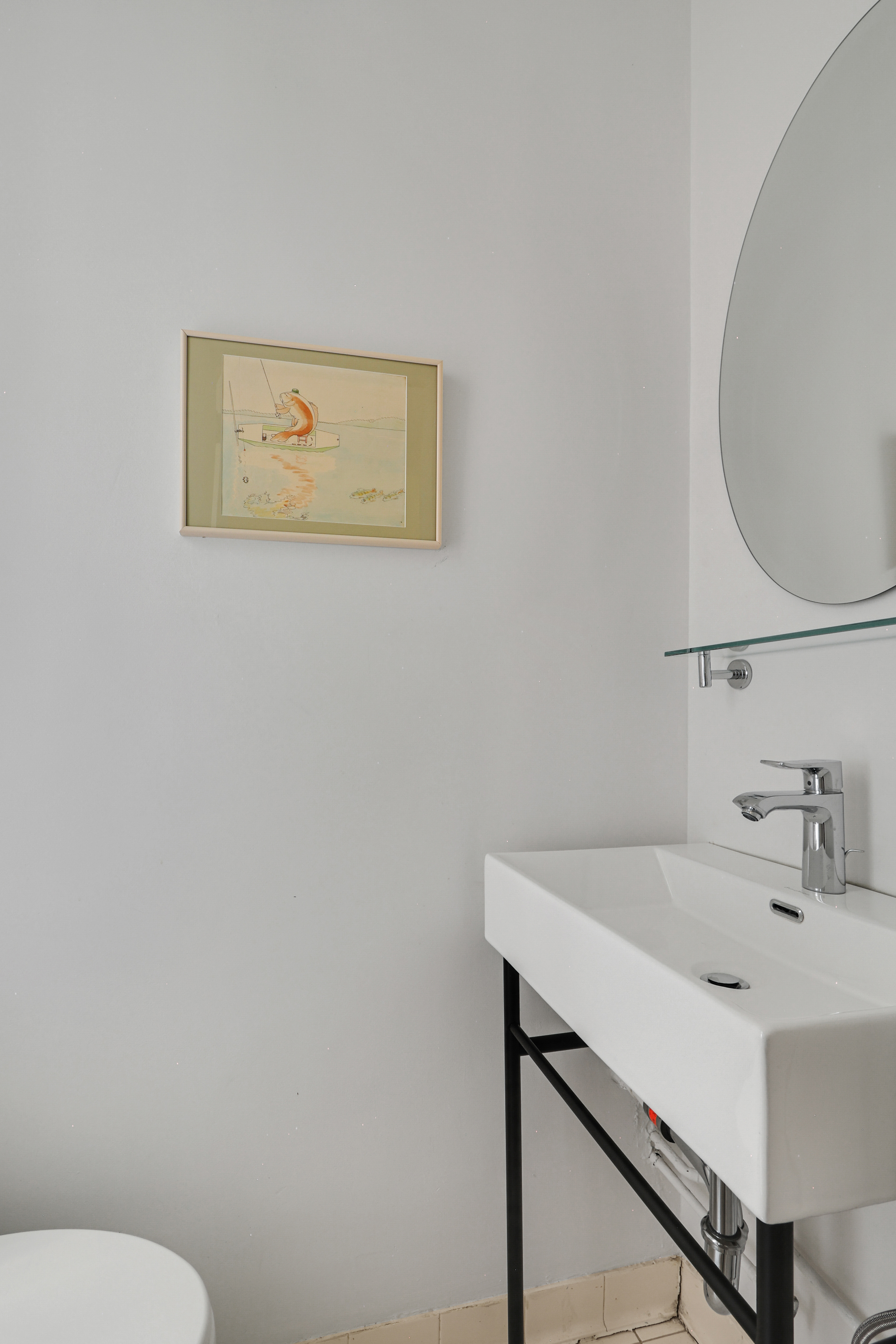 311 West 97th Street, Unit 6E Manhattan, NY 10025 - Photo 16 of 18 a bathroom with a sink and a toilet