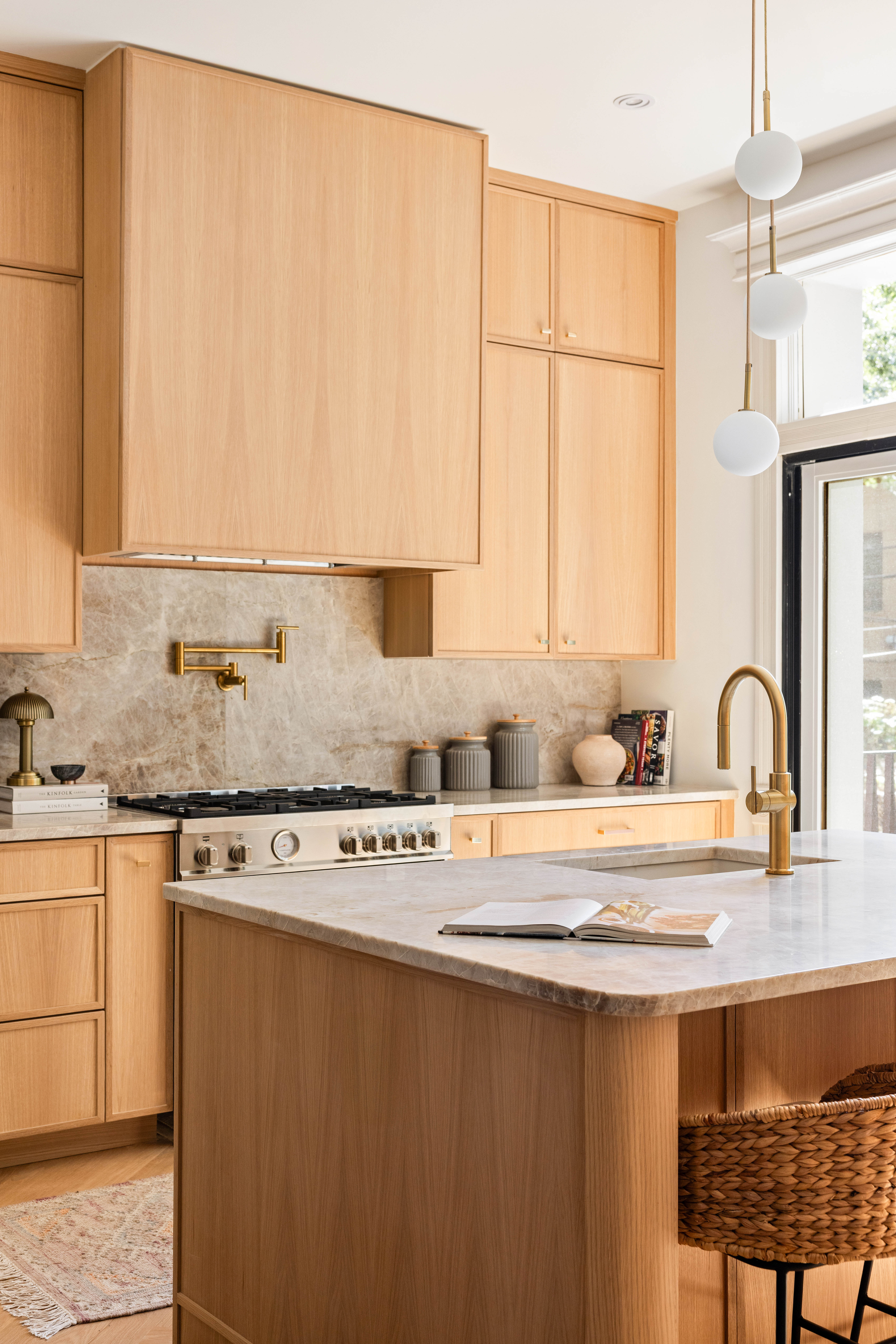 444 Quincy Street Brooklyn, NY 11221 - Photo 6 of 16 a kitchen with stainless steel appliances granite countertop a sink window and cabinets