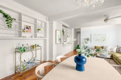 a dining room filled with furniture