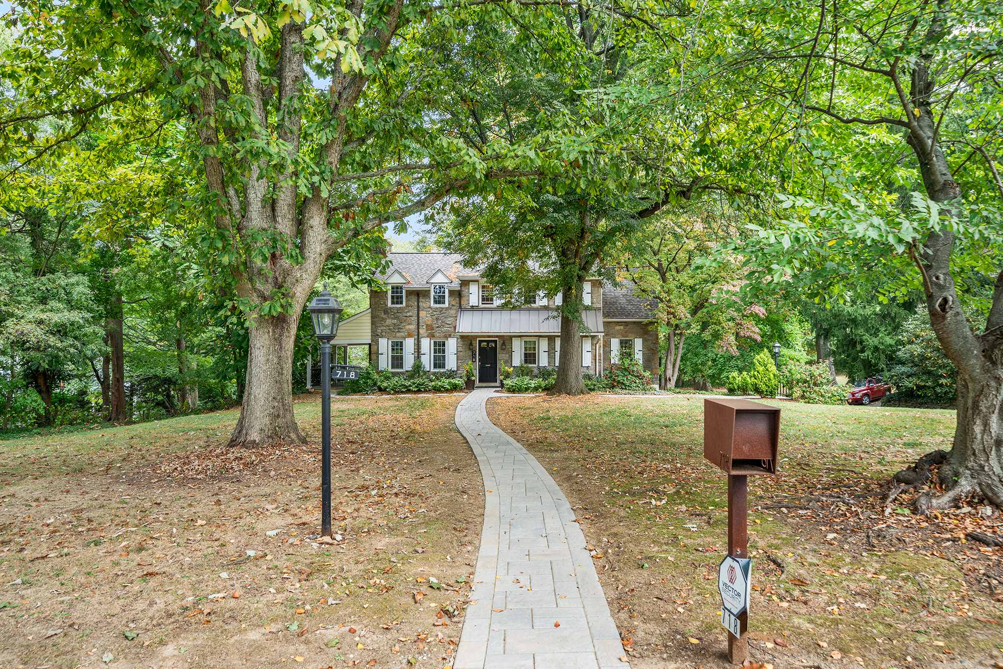 718 Arlington Road Narberth, PA 19072 - Photo 43 of 47 a front view of a house with a yard