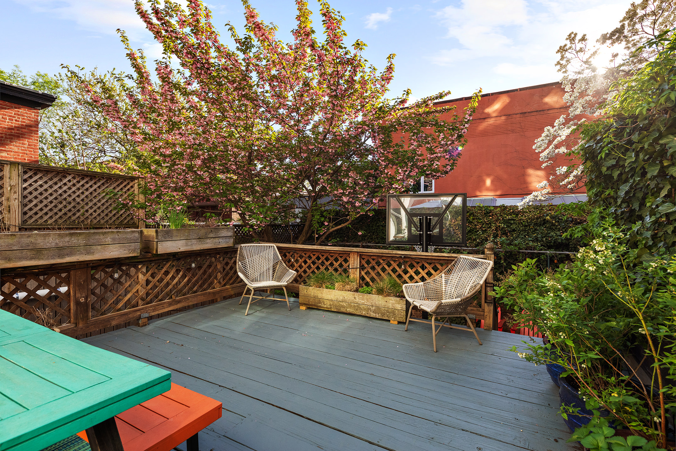 264 Clinton Avenue Brooklyn, NY 11205 - Photo 19 of 21 an outdoor sitting area with couch and wooden floor