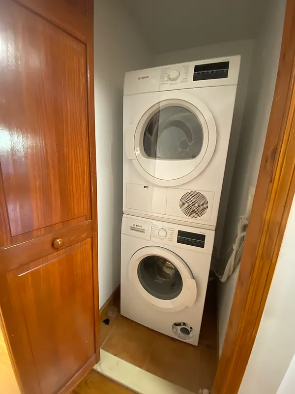 62 Bainbridge Street, Unit 4 Brooklyn, NY 11233 - Photo 8 of 8 a utility room with dryer and washer