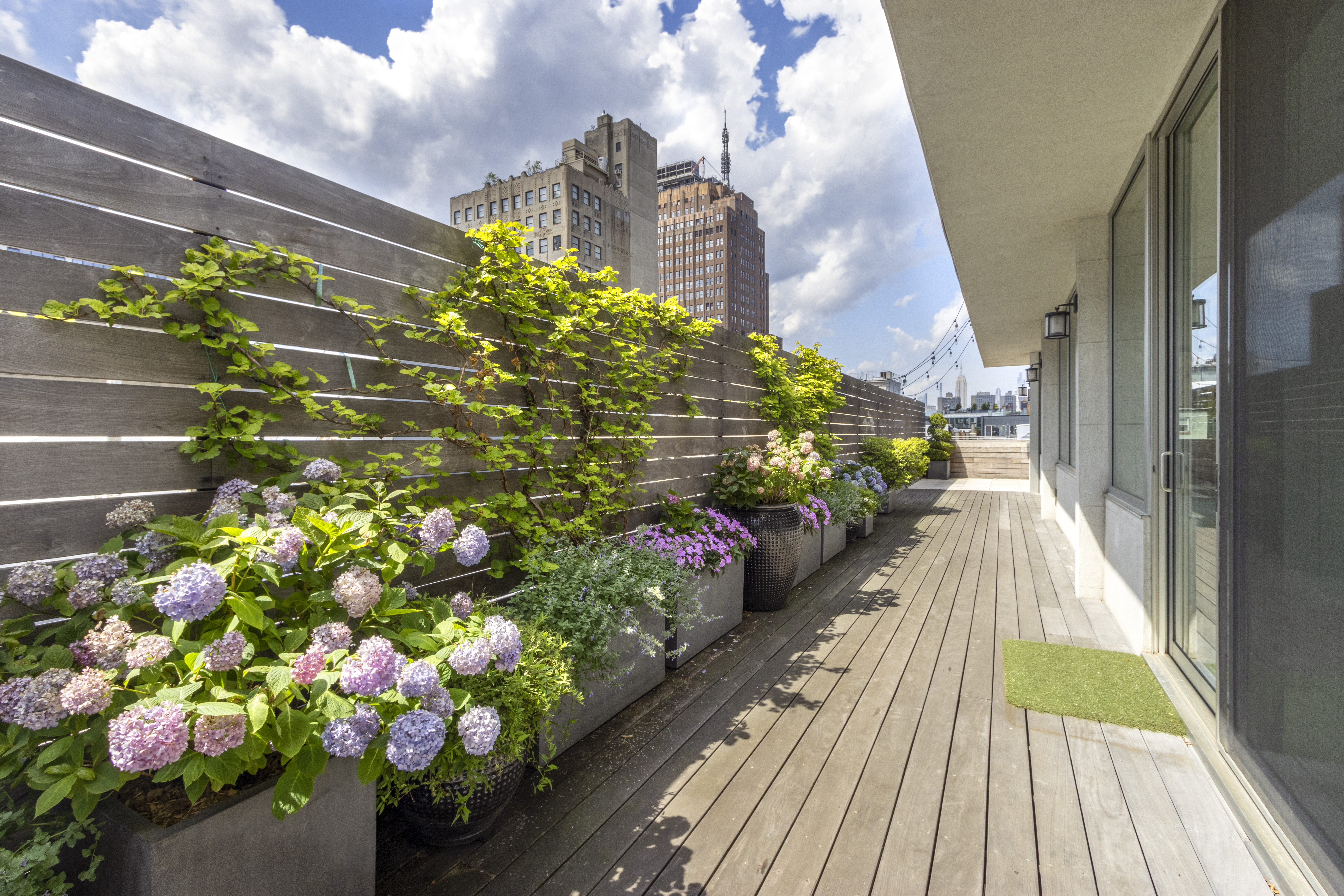 85 Leonard Street, Unit PH Manhattan, NY 10013 - Photo 21 of 27 a view of a pathway with flowers