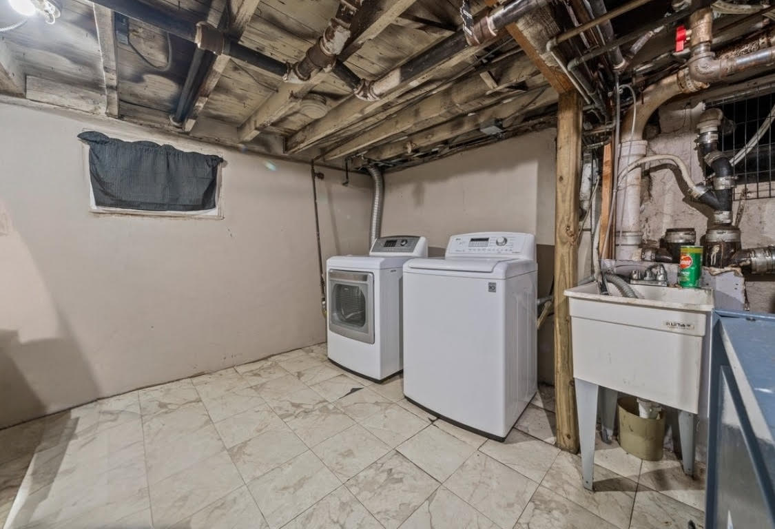 1419 East 54th Street Brooklyn, NY 11234 - Photo 15 of 19 a utility room with dryer and washer