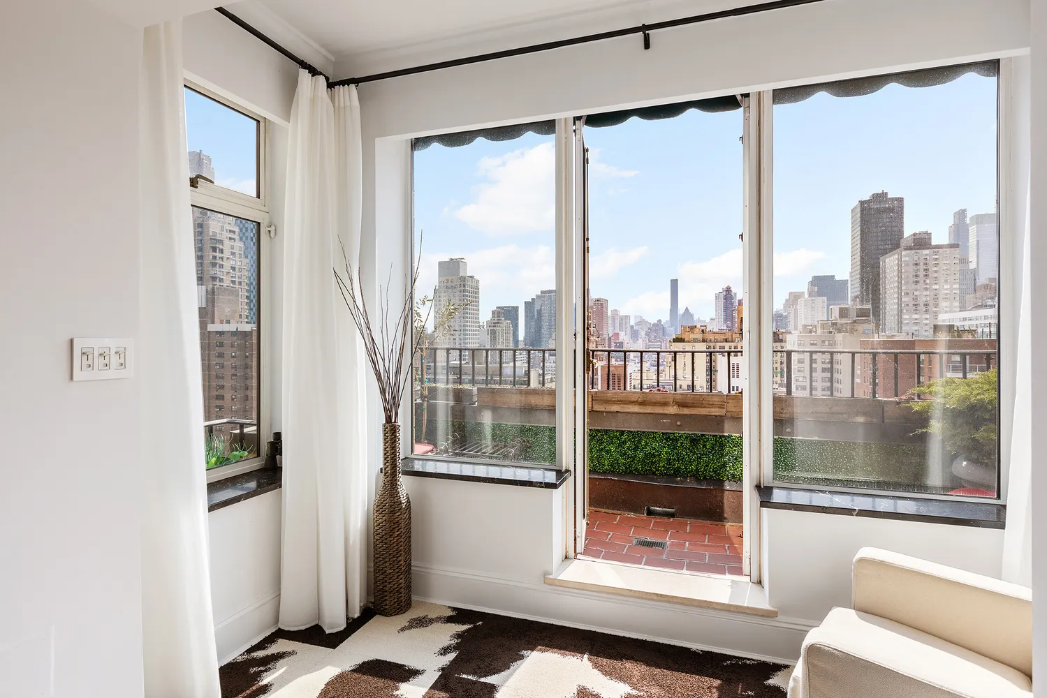 a view of a city from a living room