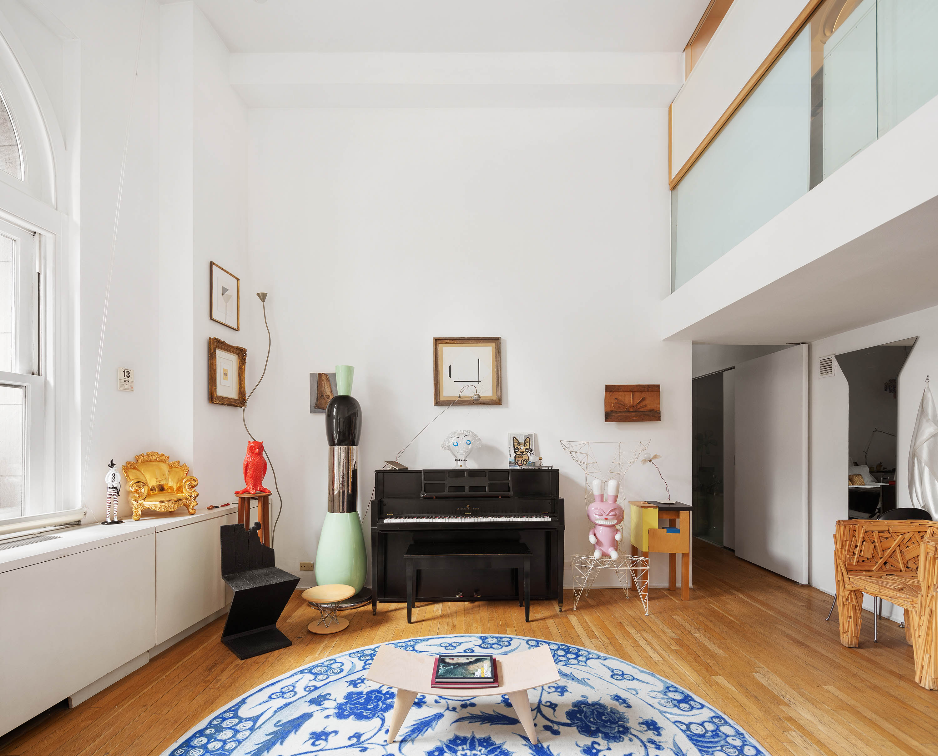 240 Centre Street, Unit 2B Manhattan, NY 10013 - Photo 2 of 12 a bedroom with furniture and a rug