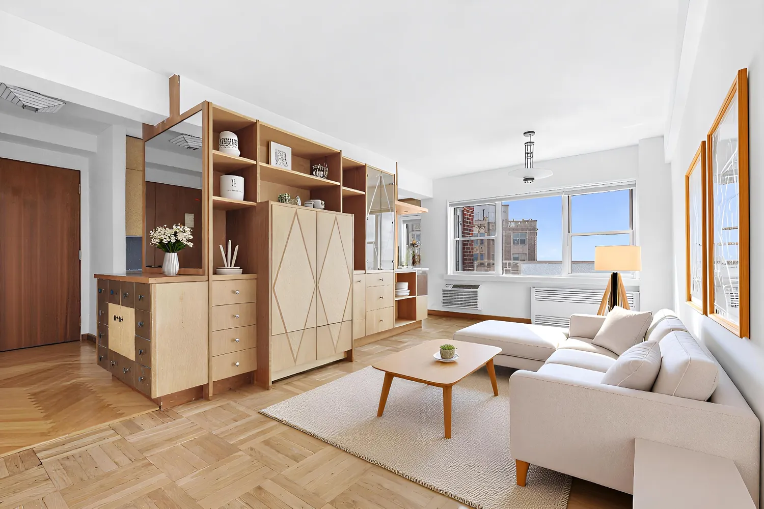 a living room with furniture and a window