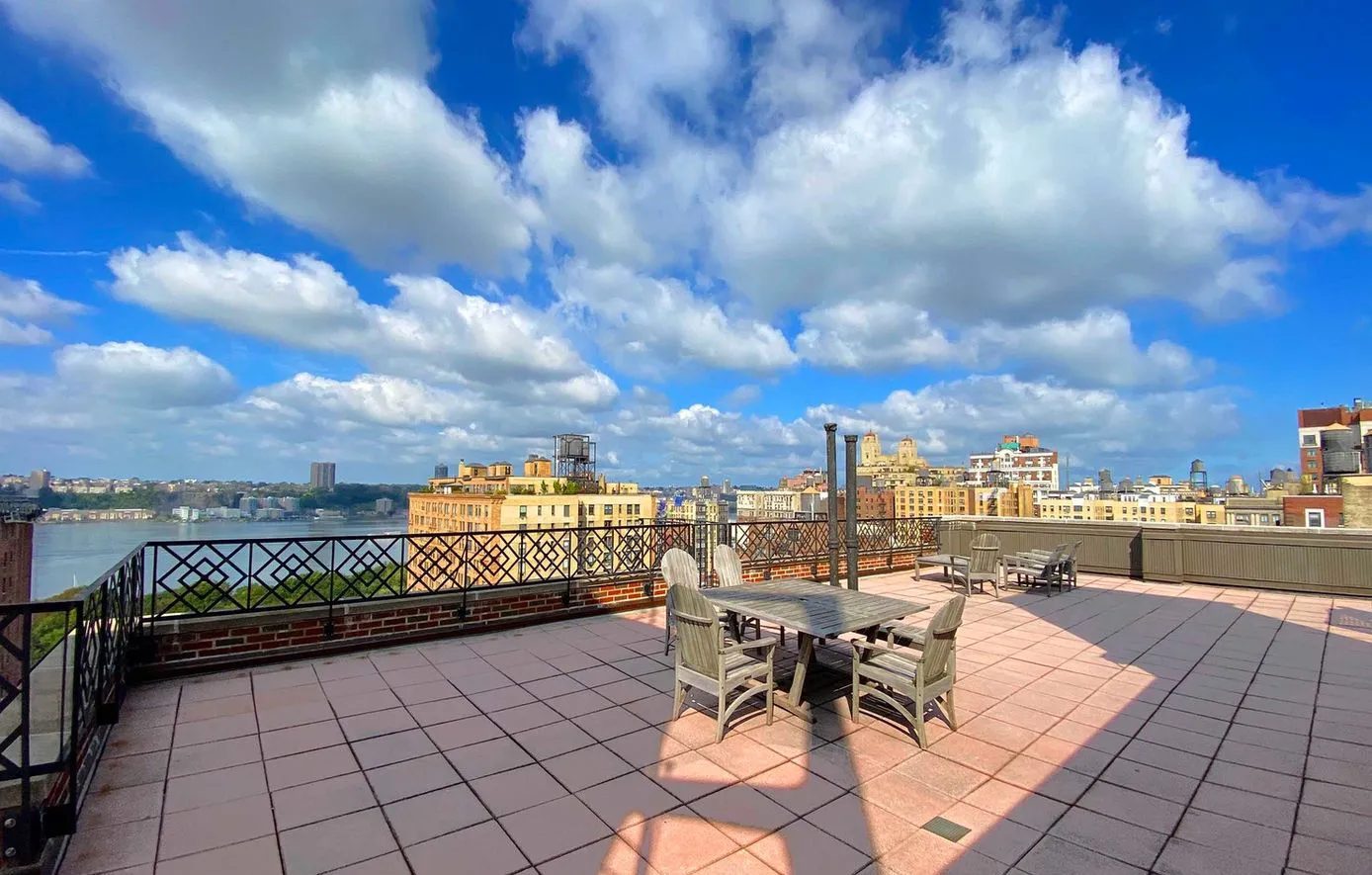 a view of roof deck with seating space