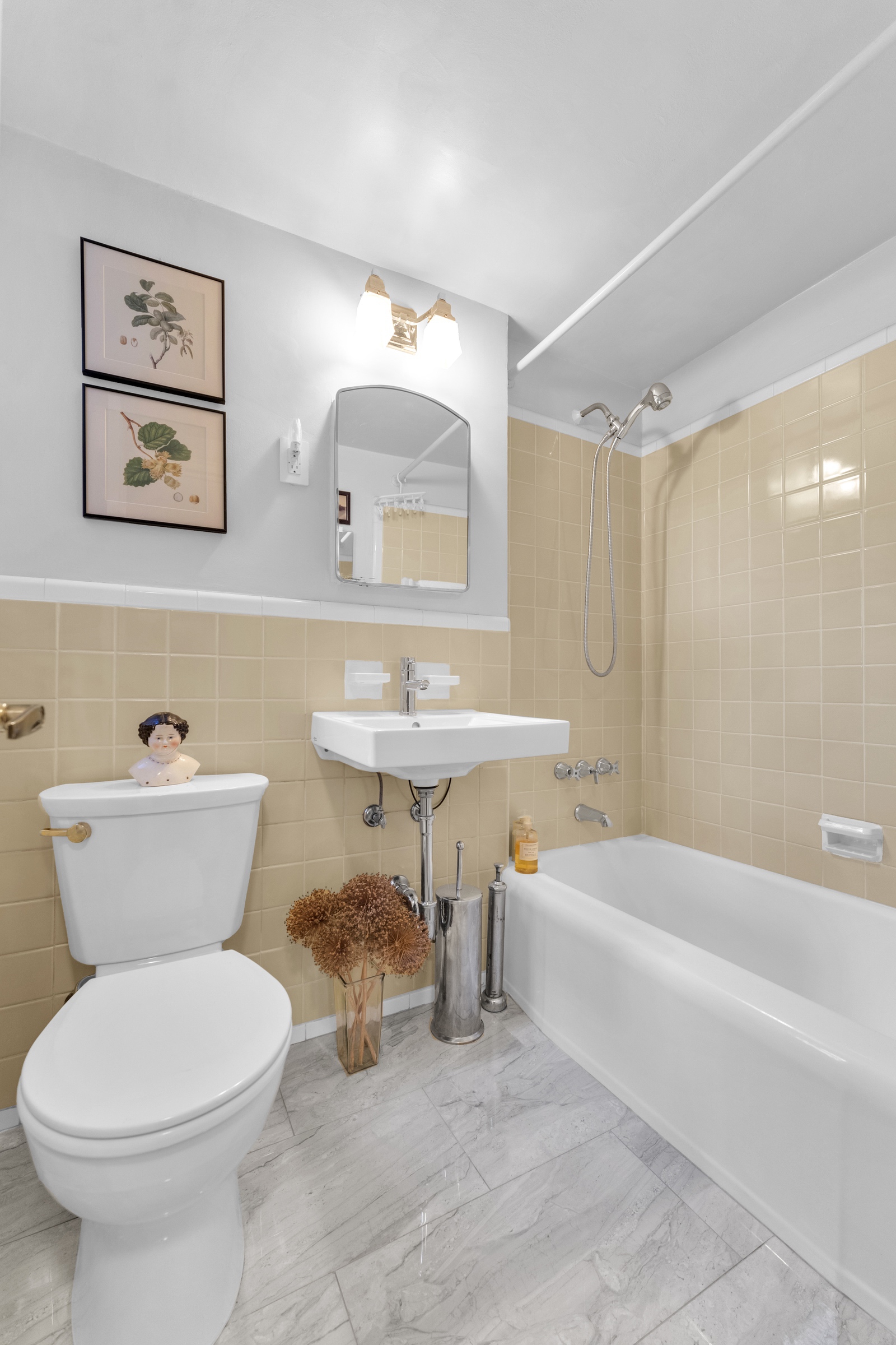 4555 Henry Hudson Parkway West, Unit A310 Bronx, NY 10471 - Photo 12 of 16 a bathroom with a sink a toilet and a bathtub