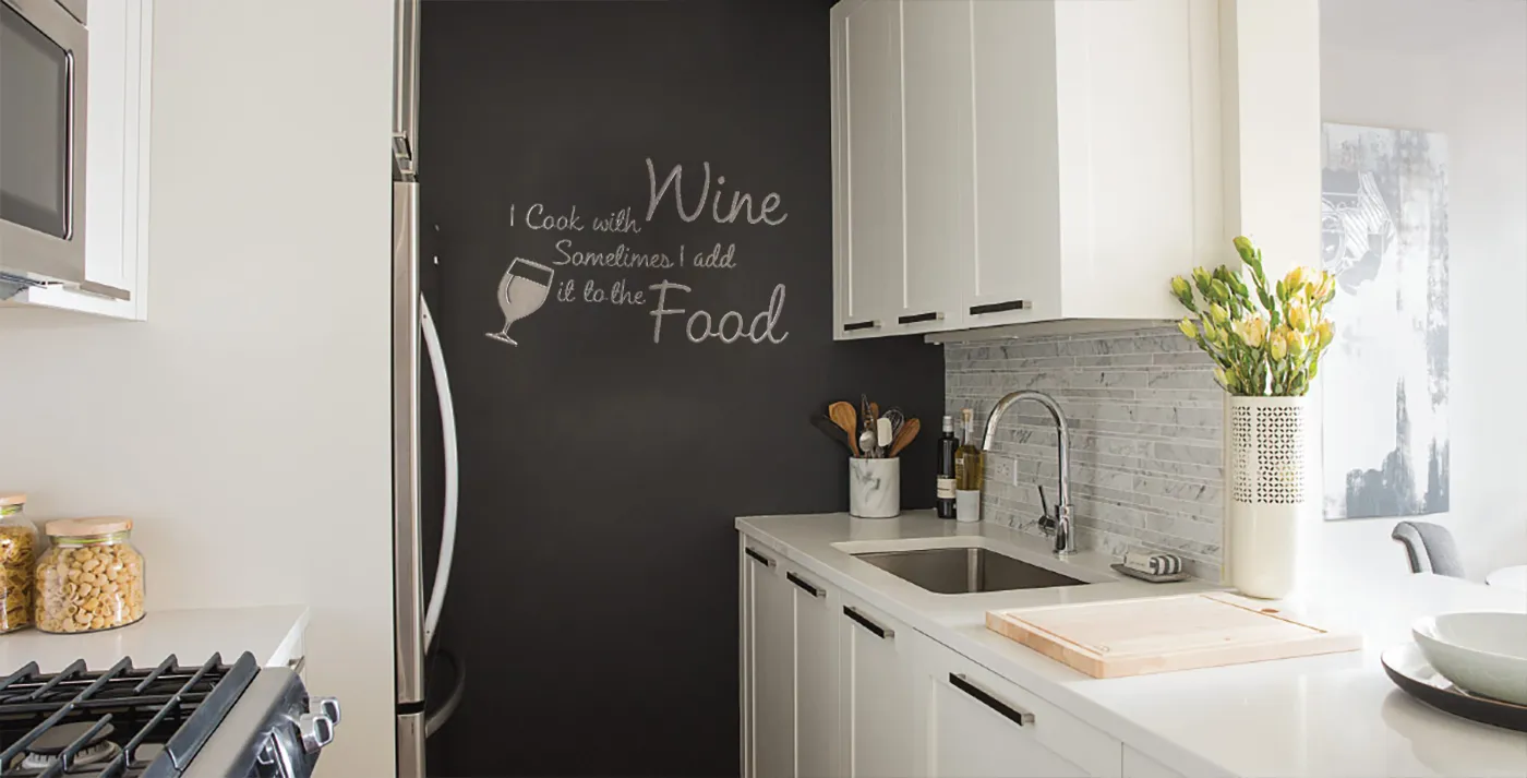 a kitchen with a sink and a stove top oven