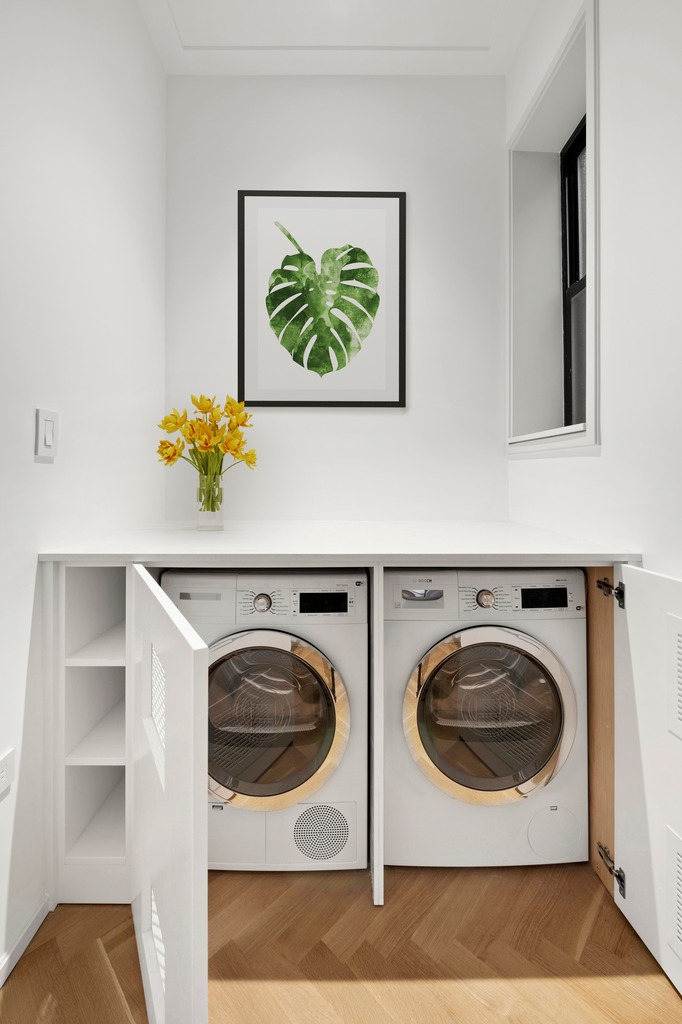 214 Clinton Street, Unit 2E Brooklyn, NY 11201 - Photo 10 of 11 a utility room with dryer and washer