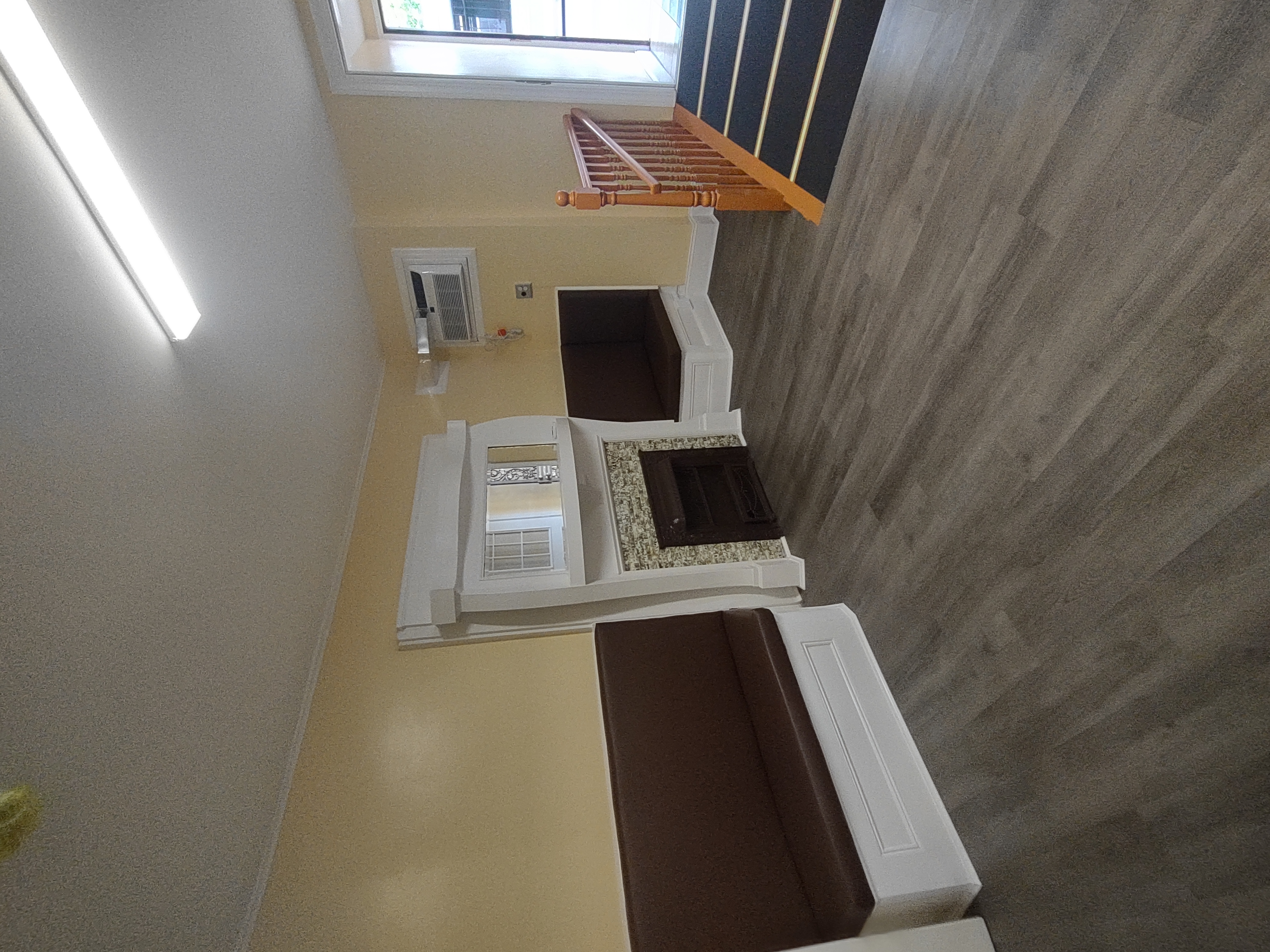 175 Fenimore Street Brooklyn, NY 11225 - Photo 3 of 11 a living room with furniture and a fireplace