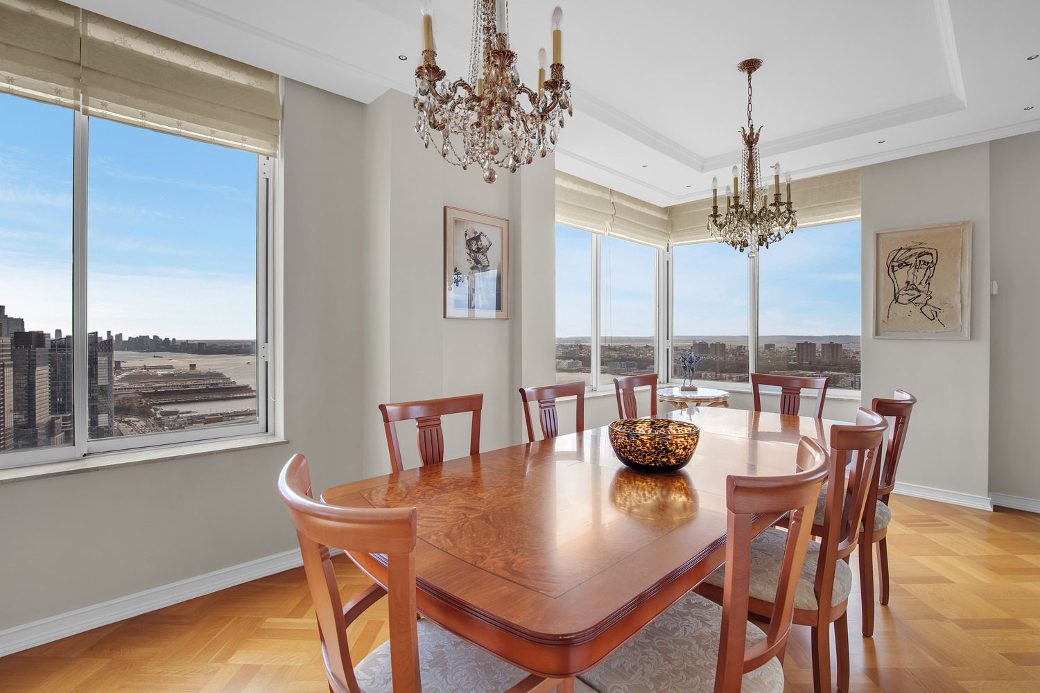 200 Riverside Boulevard, Unit 44A Manhattan, NY 10069 - Photo 5 of 22 a dining room with furniture a chandelier and window