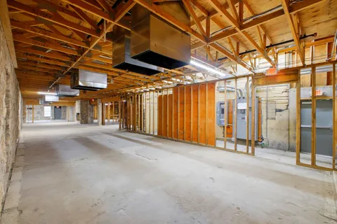 a view of a room with wooden walls