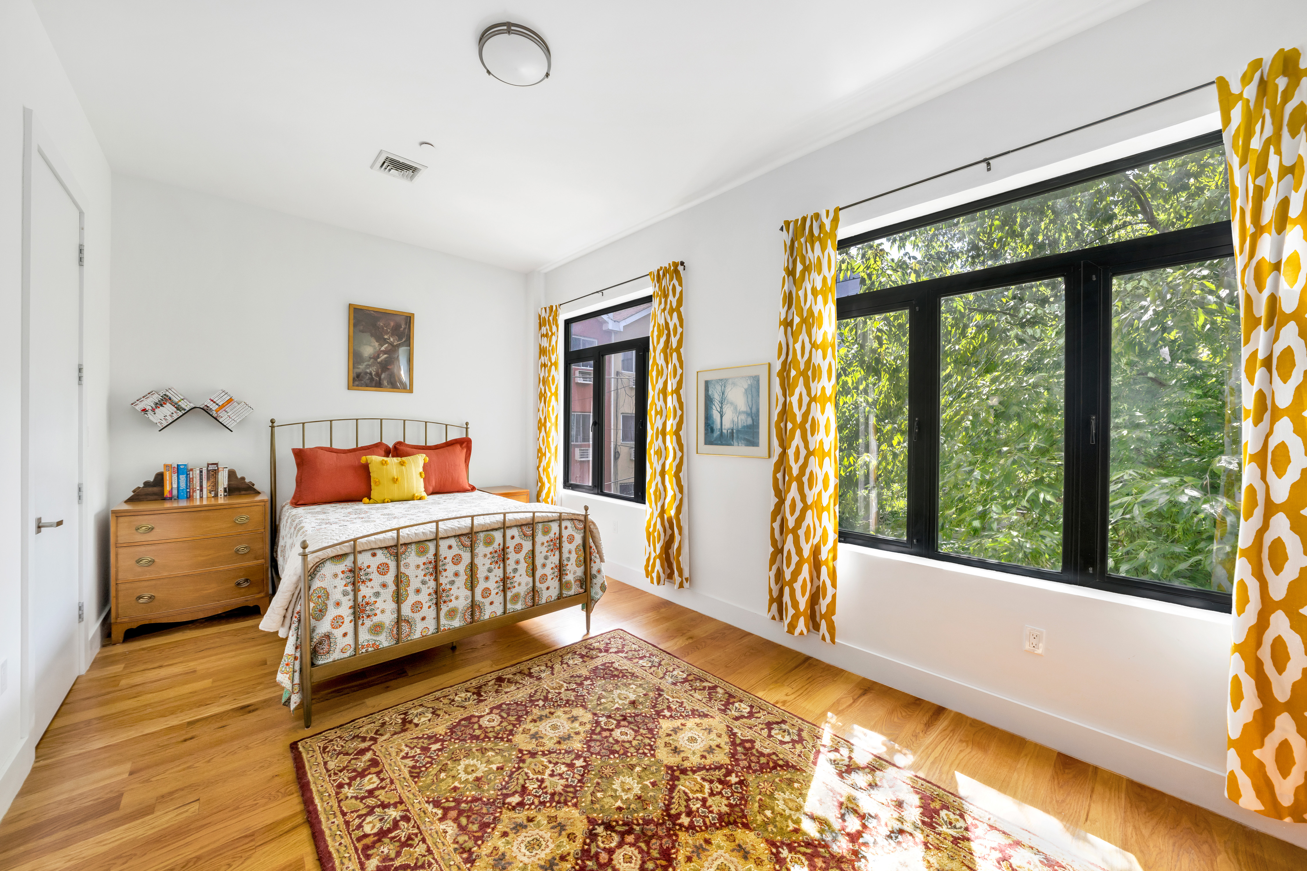 90 Troy Avenue, Unit 2 Brooklyn, NY 11213 - Photo 6 of 12 a bedroom with a large bed and a window