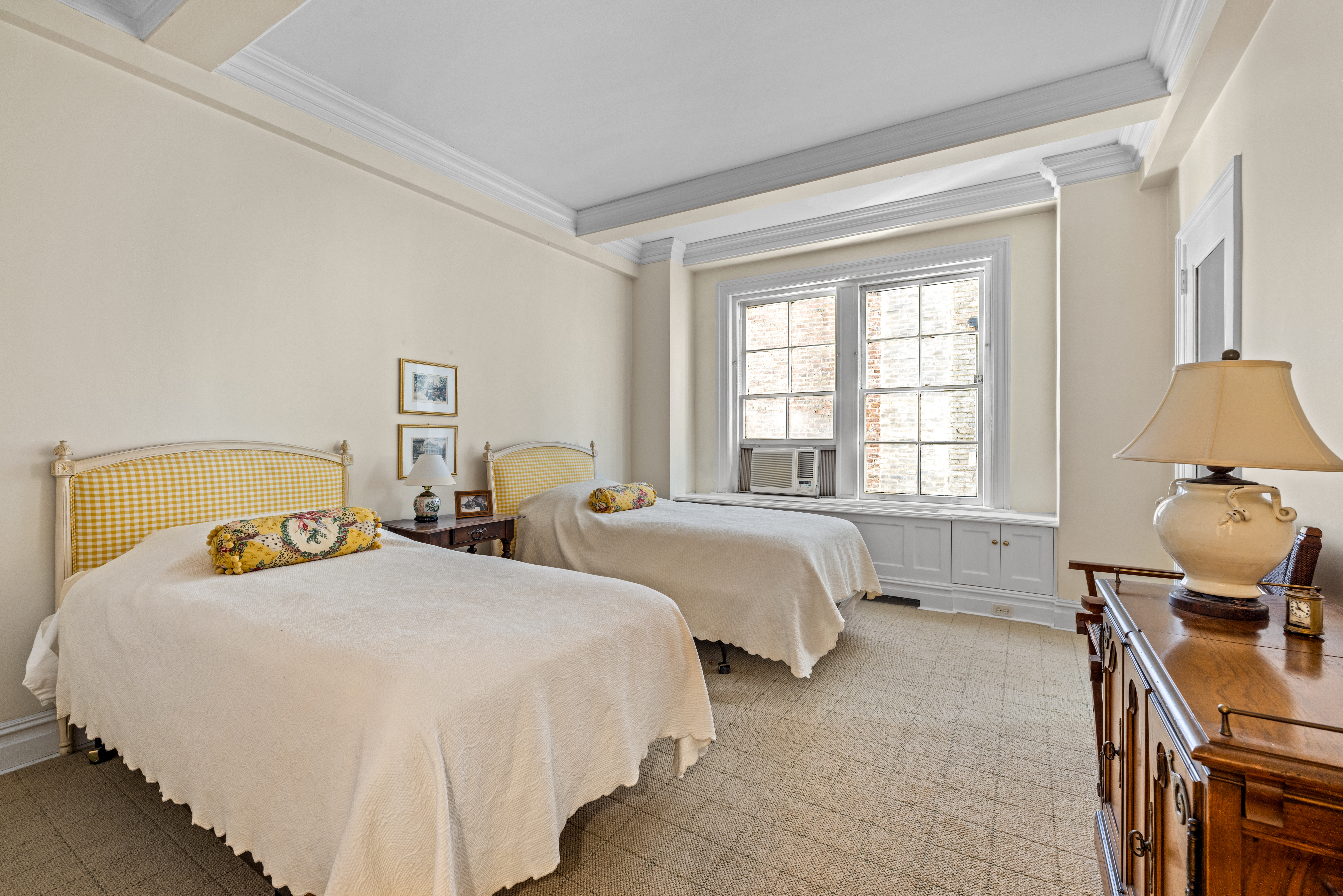 75 Central Park West, Unit 5A Manhattan, NY 10023 - Photo 10 of 14 a bedroom with two beds and wooden floor