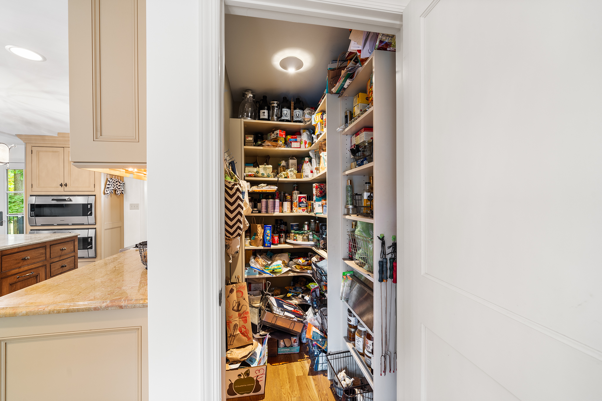 718 Arlington Road Narberth, PA 19072 - Photo 9 of 47 a view of a kitchen with fridge and rack