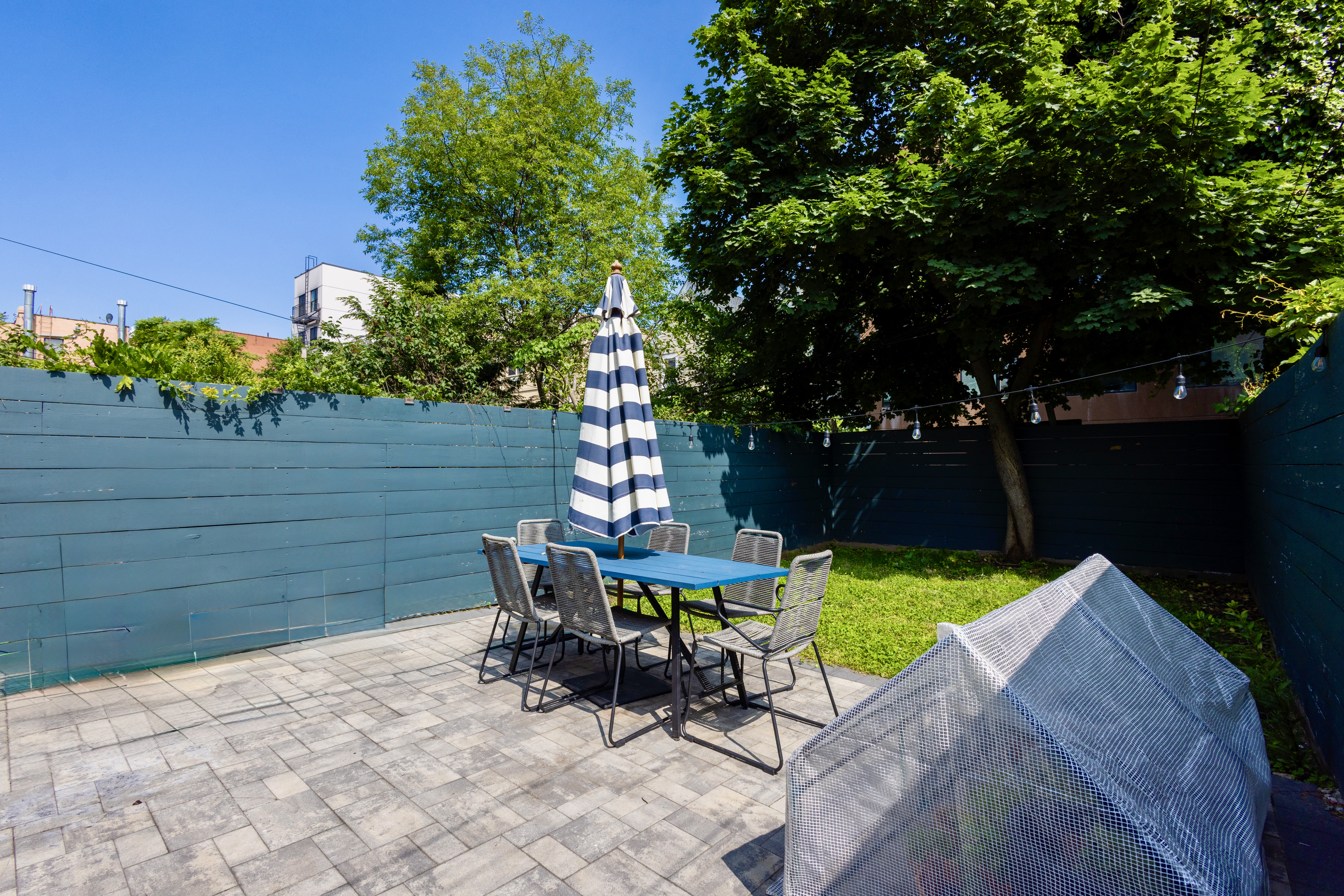 239 Winthrop Street Brooklyn, NY 11225 - Photo 9 of 20 a view of a chairs and table in the patio