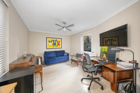 a view of a workspace with furniture