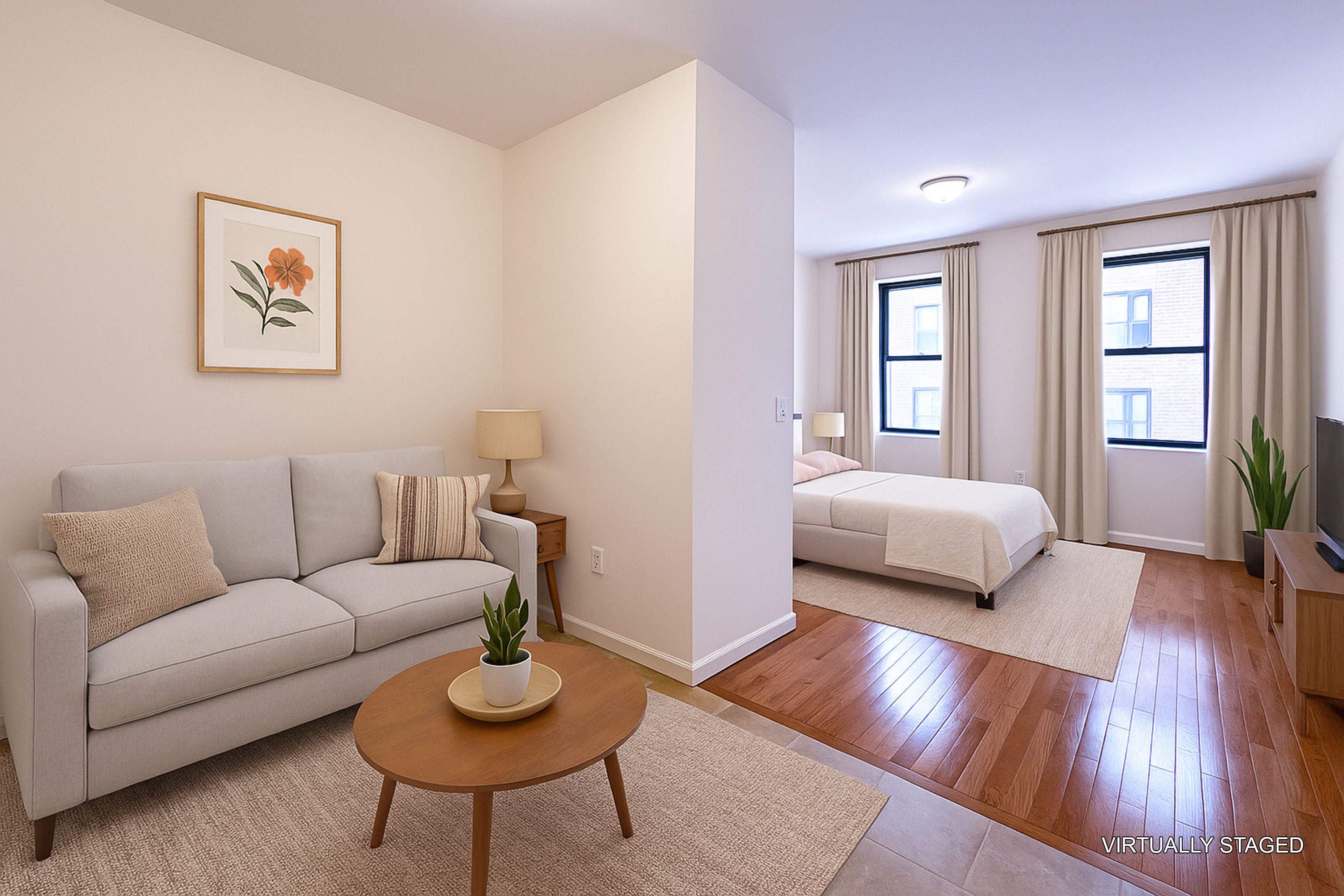 a bedroom with furniture and a wooden floor