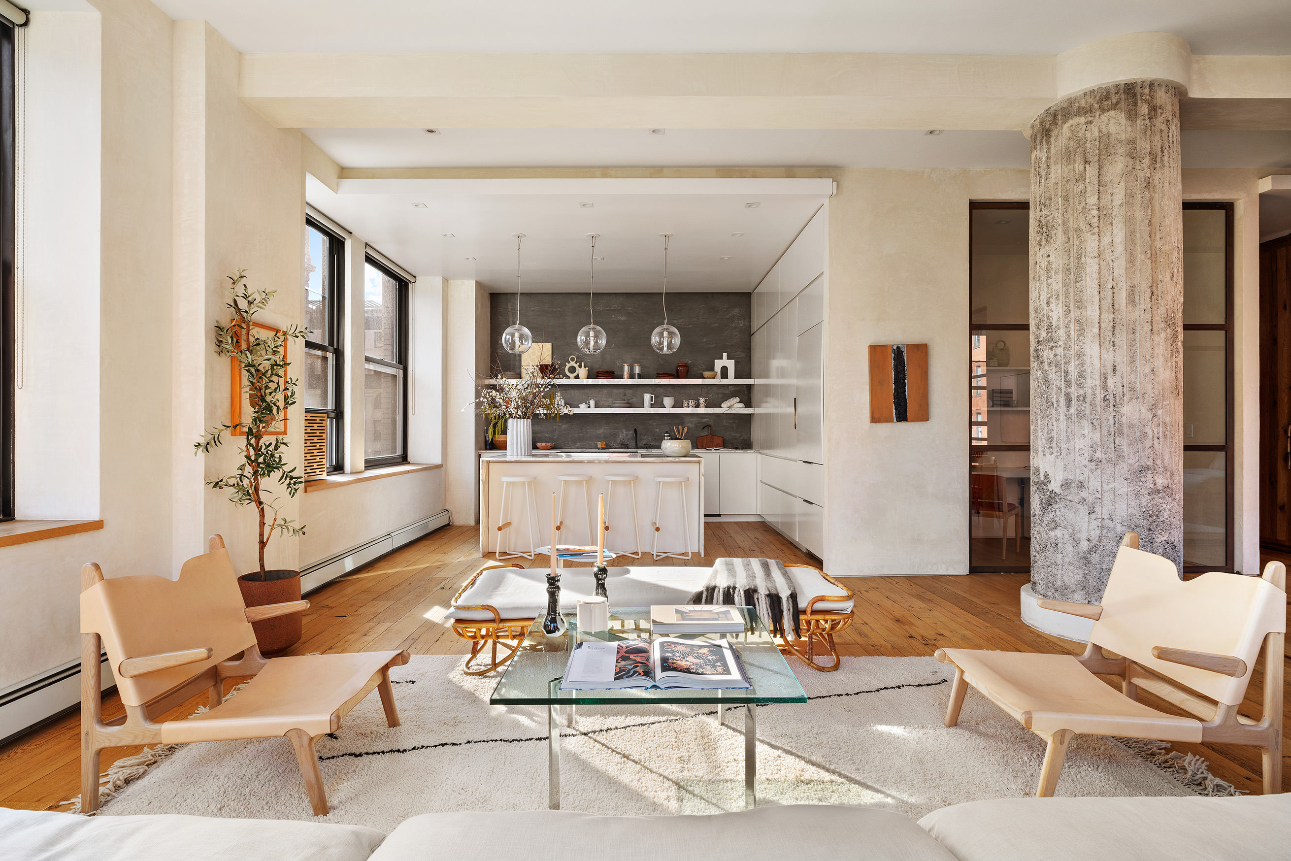 250 Mercer Street, Unit B706B707 Manhattan, NY 10012 - Photo 3 of 25 a living room with furniture and a table
