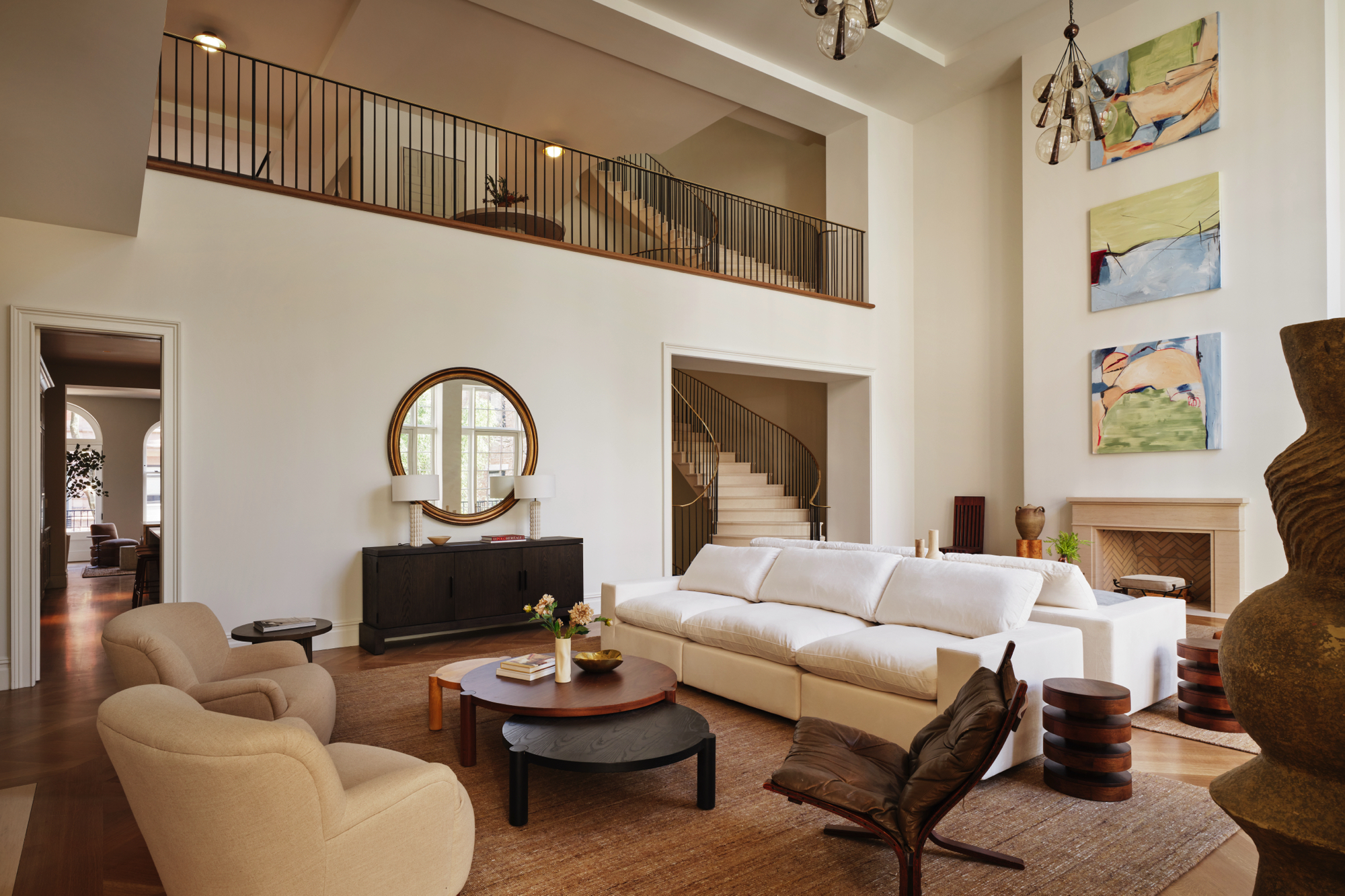 48-50 West 69th Street Manhattan, NY 10023 - Photo 2 of 33 a living room with furniture a rug and a fireplace