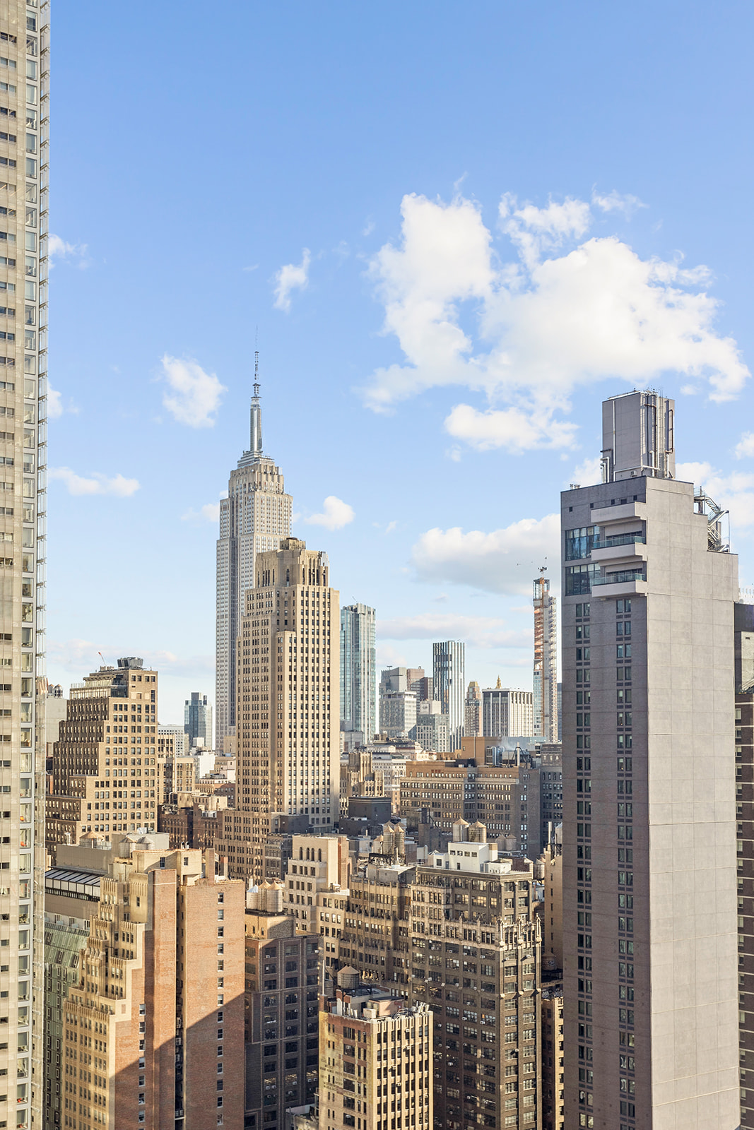 350 West 42nd Street, Unit 33G Manhattan, NY 10036 - Photo 12 of 20 a view of a city with tall buildings