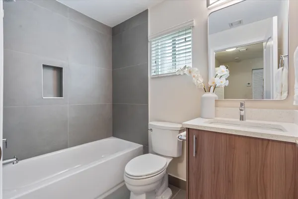 a view of a storage and utility room with a washer and dryer