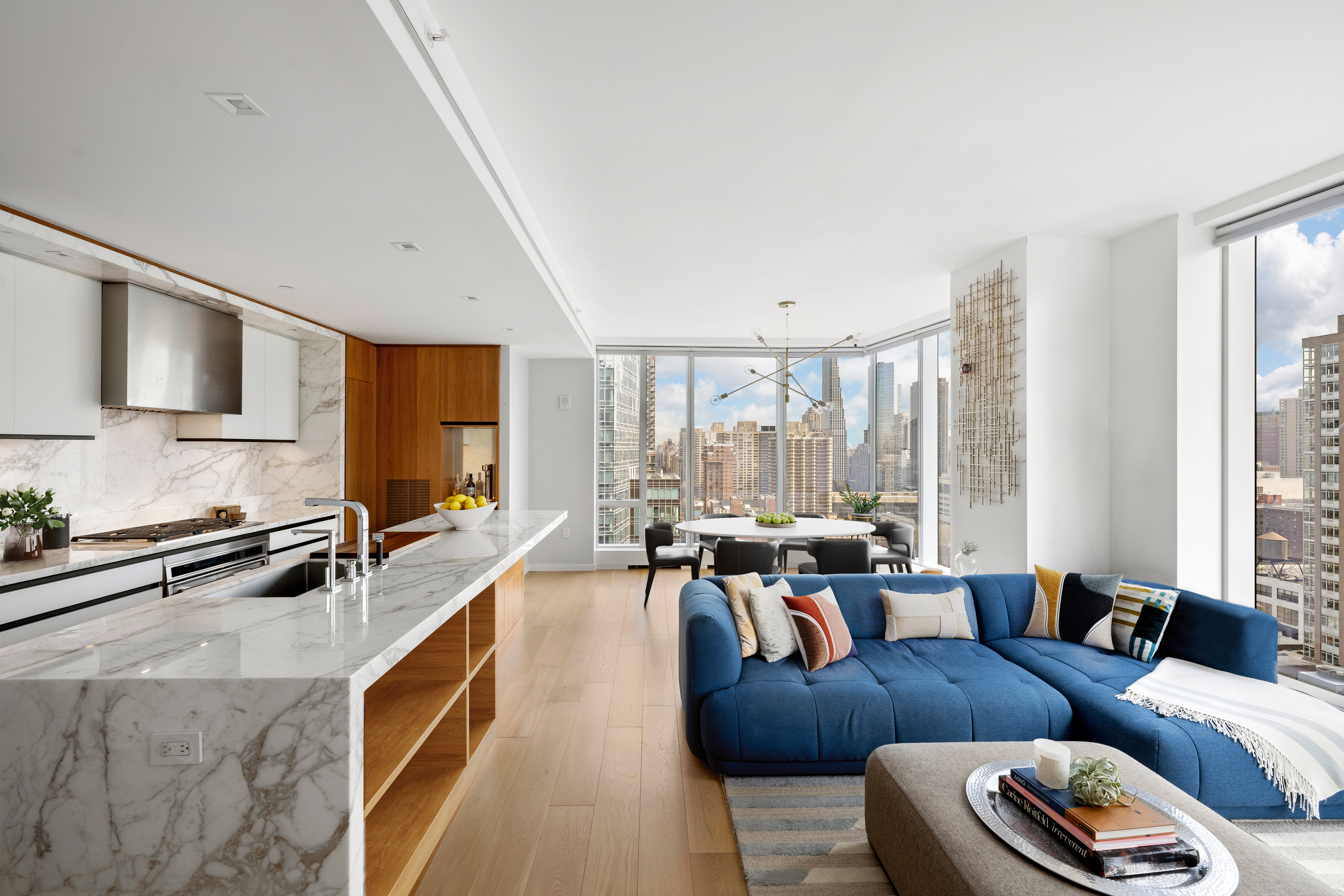 1 West End Avenue, Unit 22C Manhattan, NY 10023 - Photo 4 of 15 a living room with furniture and a large window
