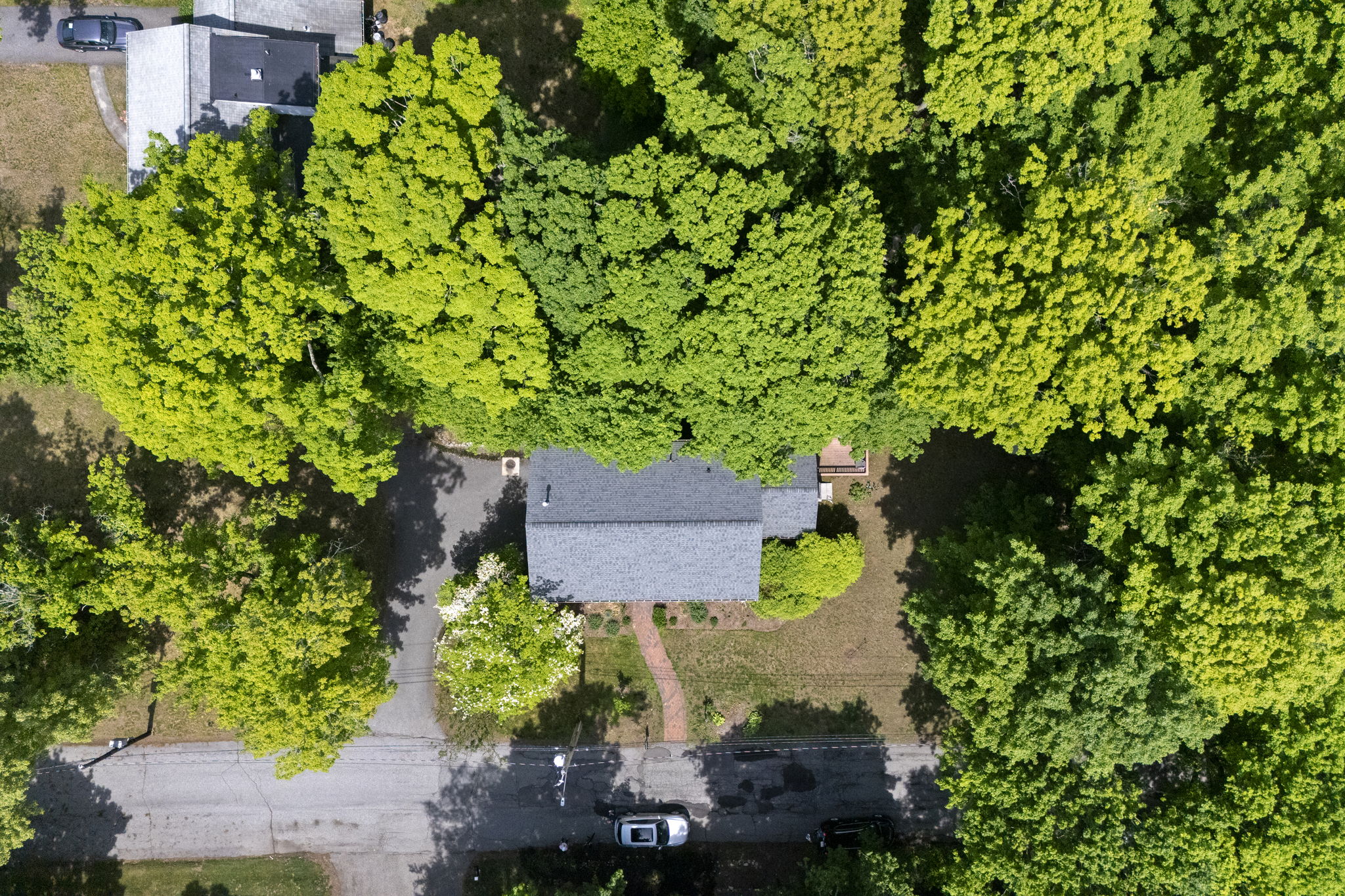 2 Laurel Street Lexington, MA 02421 - Photo 40 of 46 an aerial view of a house with a yard