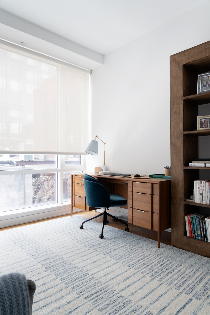 330 Spring Street, Unit 5A Manhattan, NY 10013 - Photo 9 of 13 a view of a workspace with furniture and a window