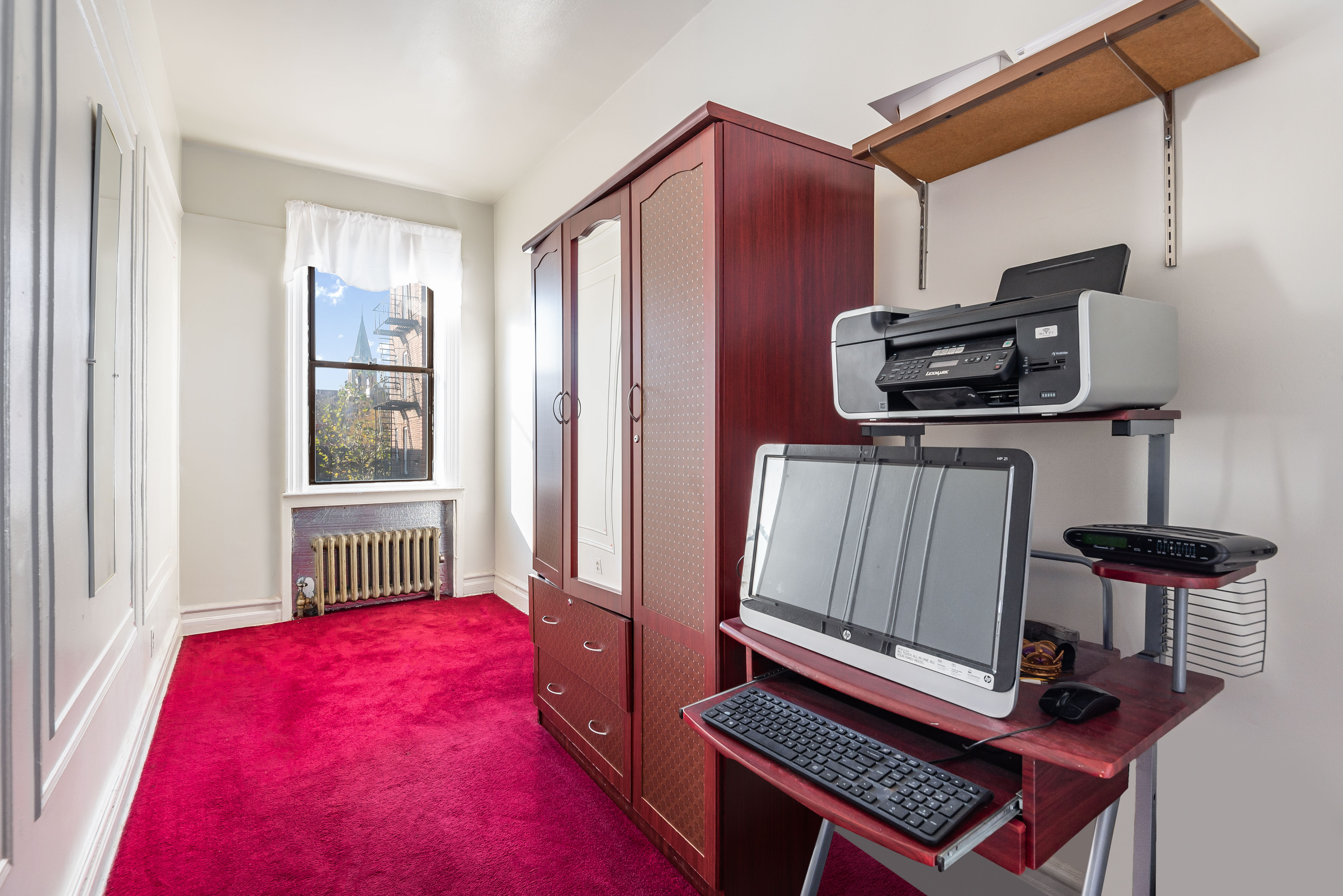 15 Lloyd Street Brooklyn, NY 11226 - Photo 8 of 18 a bedroom with furniture and a window