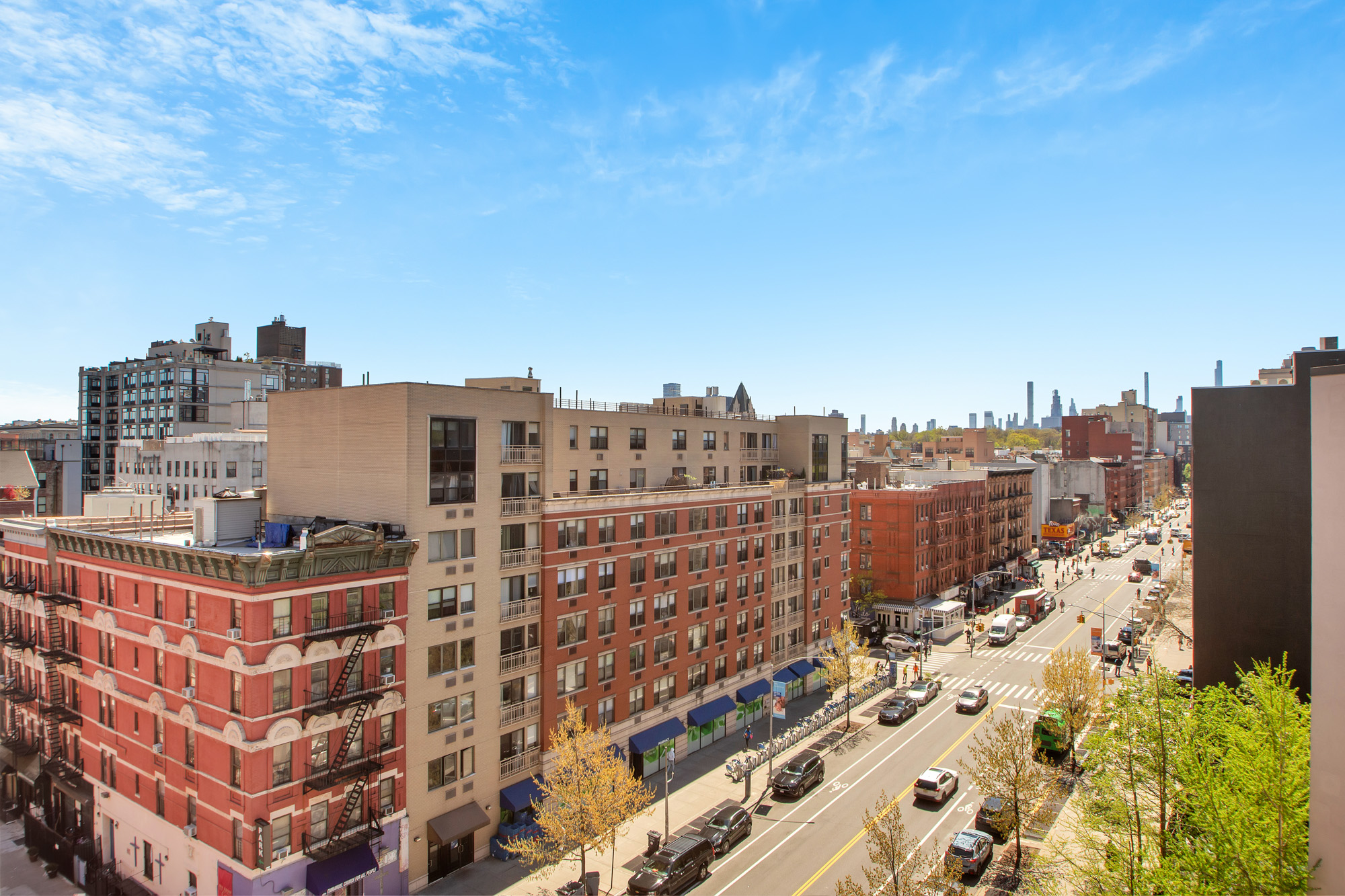 301 West 118th Street, Unit 10G Manhattan, NY 10026 - Photo 3 of 17 a view of a city with tall buildings