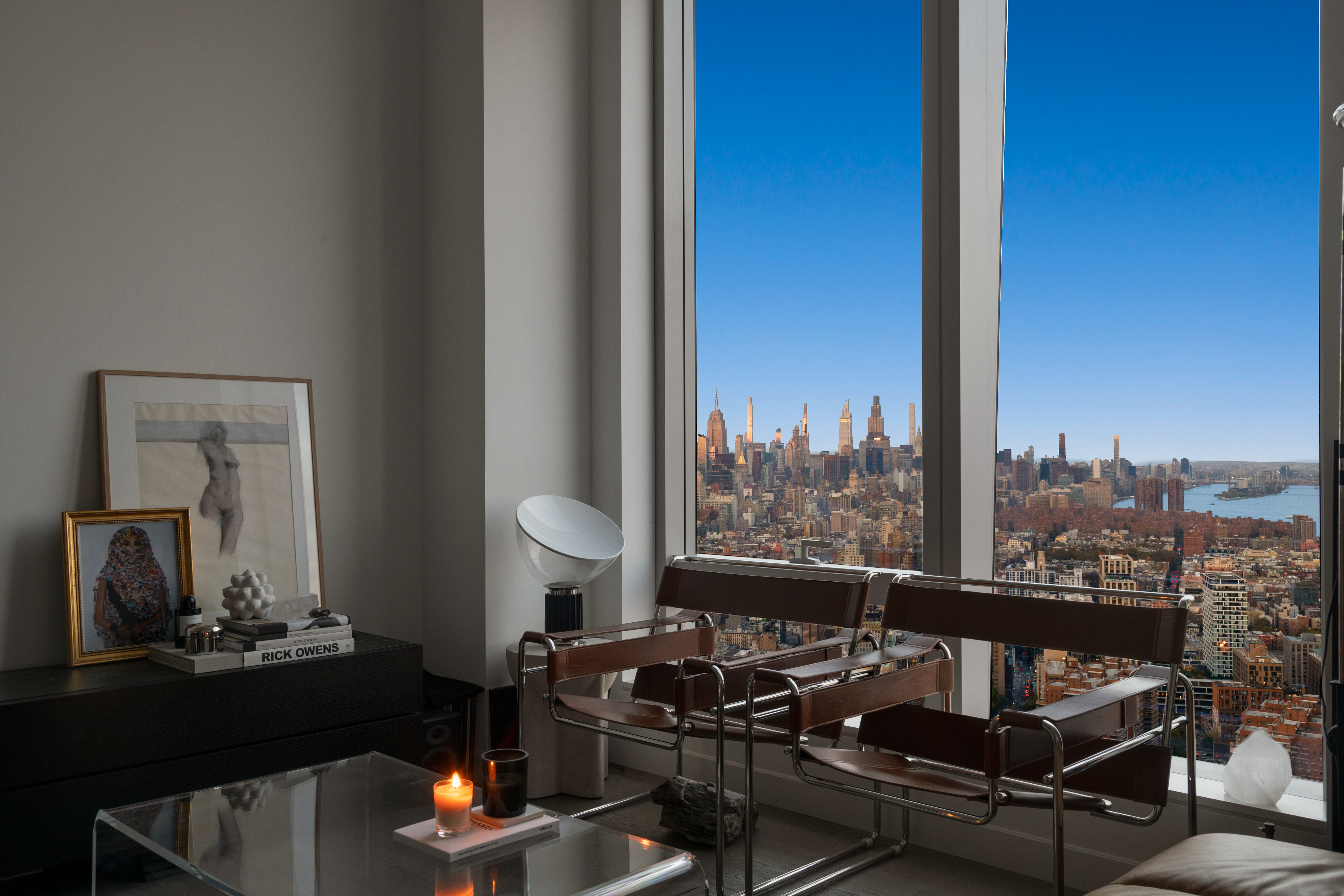 252 South Street, Unit 60G Manhattan, NY 10002 - Photo 3 of 30 a living room with furniture