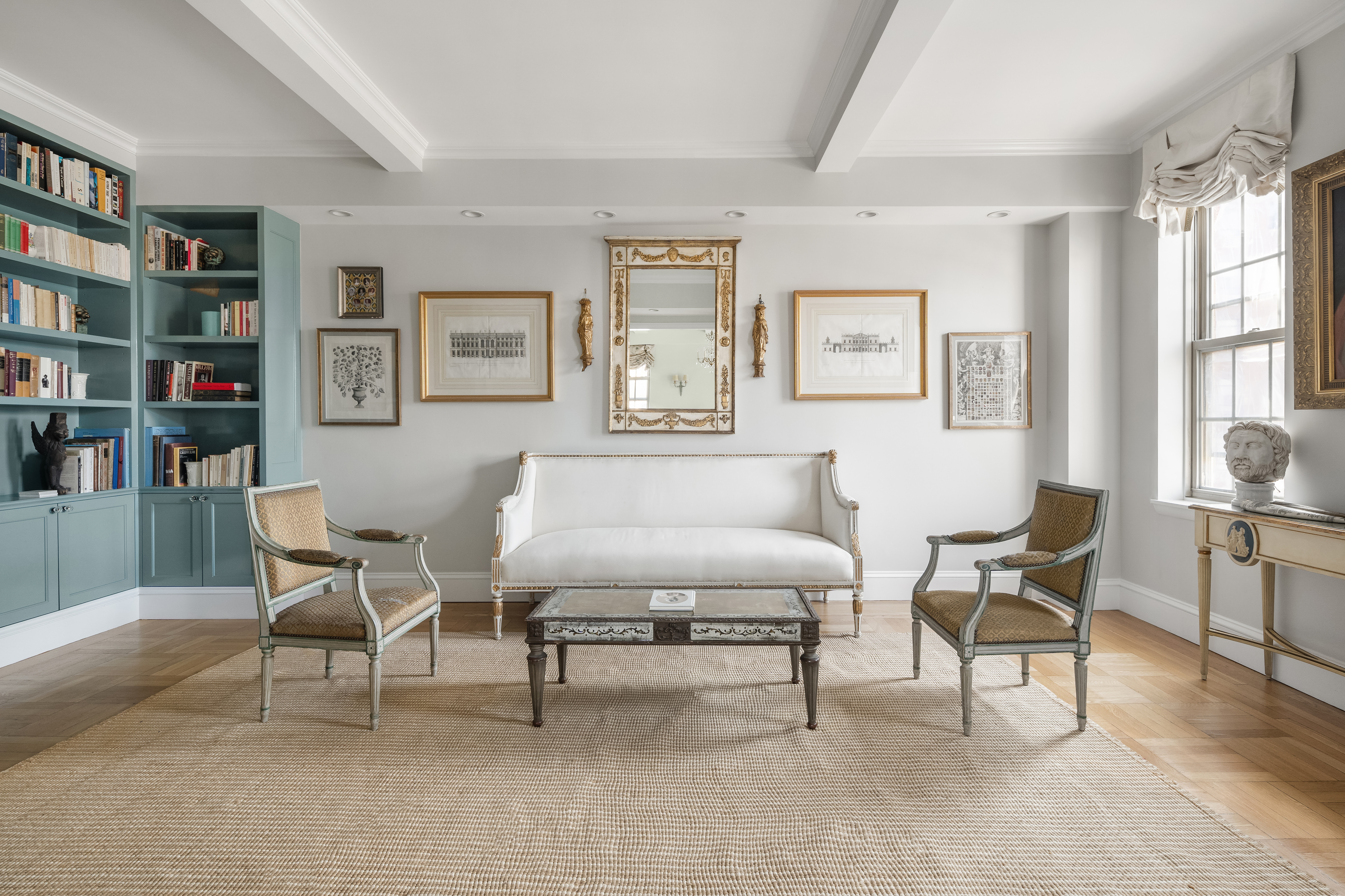 24 5th Avenue, Unit 801/802 Manhattan, NY 10011 - Photo 2 of 7 a living room with furniture and a potted plant