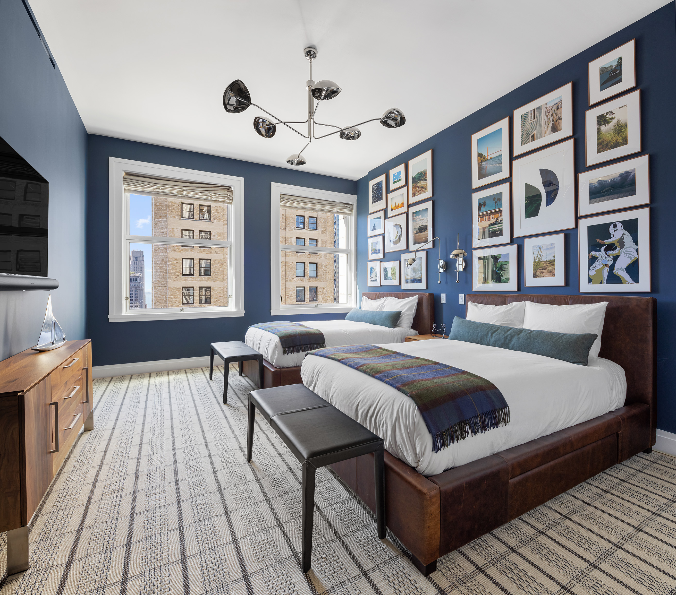 2 Park Place, Unit 35A Manhattan, NY 10007 - Photo 13 of 21 a bedroom with a large bed and a flat tv screen on dresser