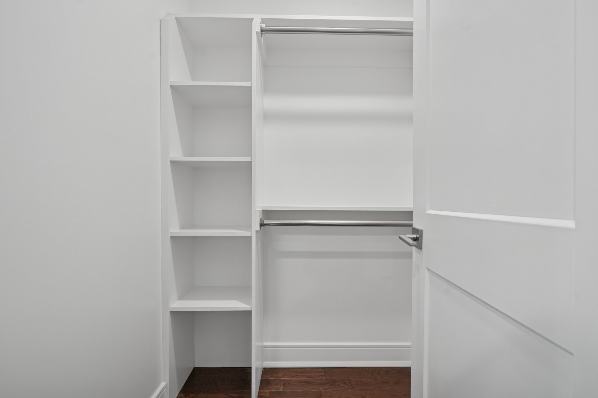 823 River Road Chatham, NJ 07928 - Photo 23 of 60 a view of an empty walk in closet