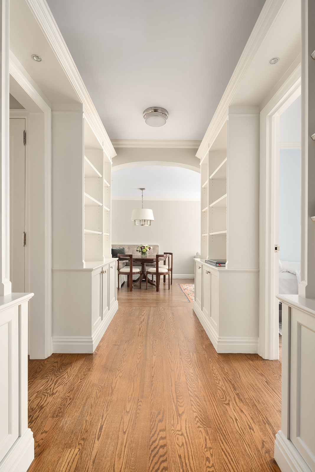 75 Bank Street, Unit 2H Manhattan, NY 10014 - Photo 6 of 18 a living room with furniture and a table