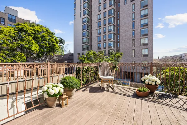 a garden view with a seating space